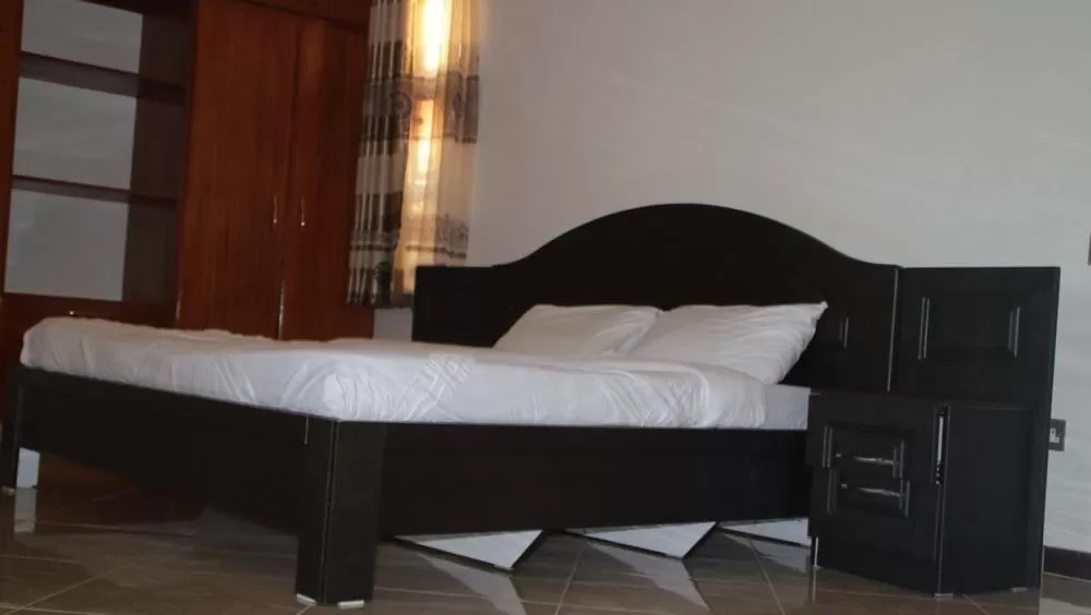 Bed in Acactus Hotel