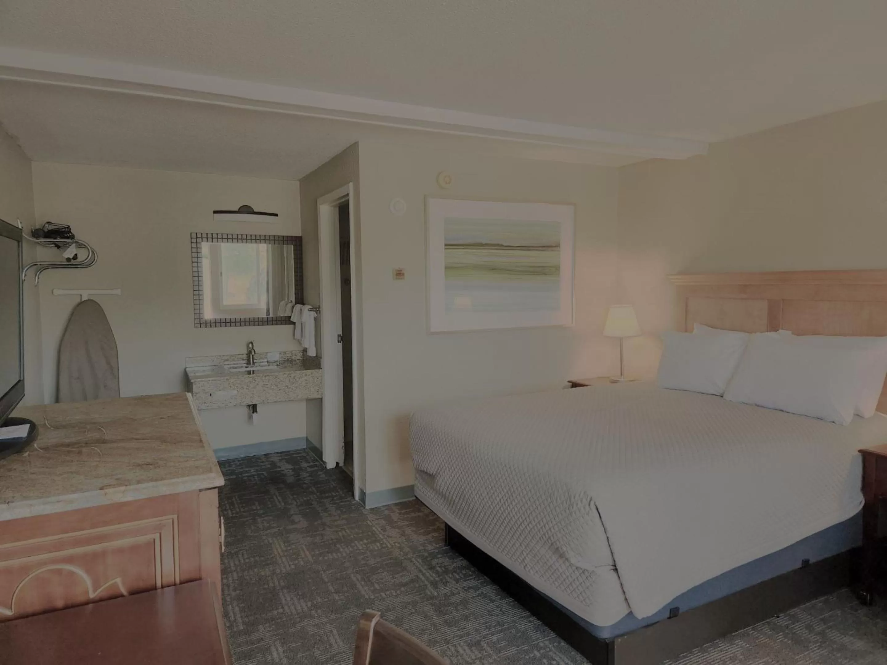 Bed in Queen City Inn