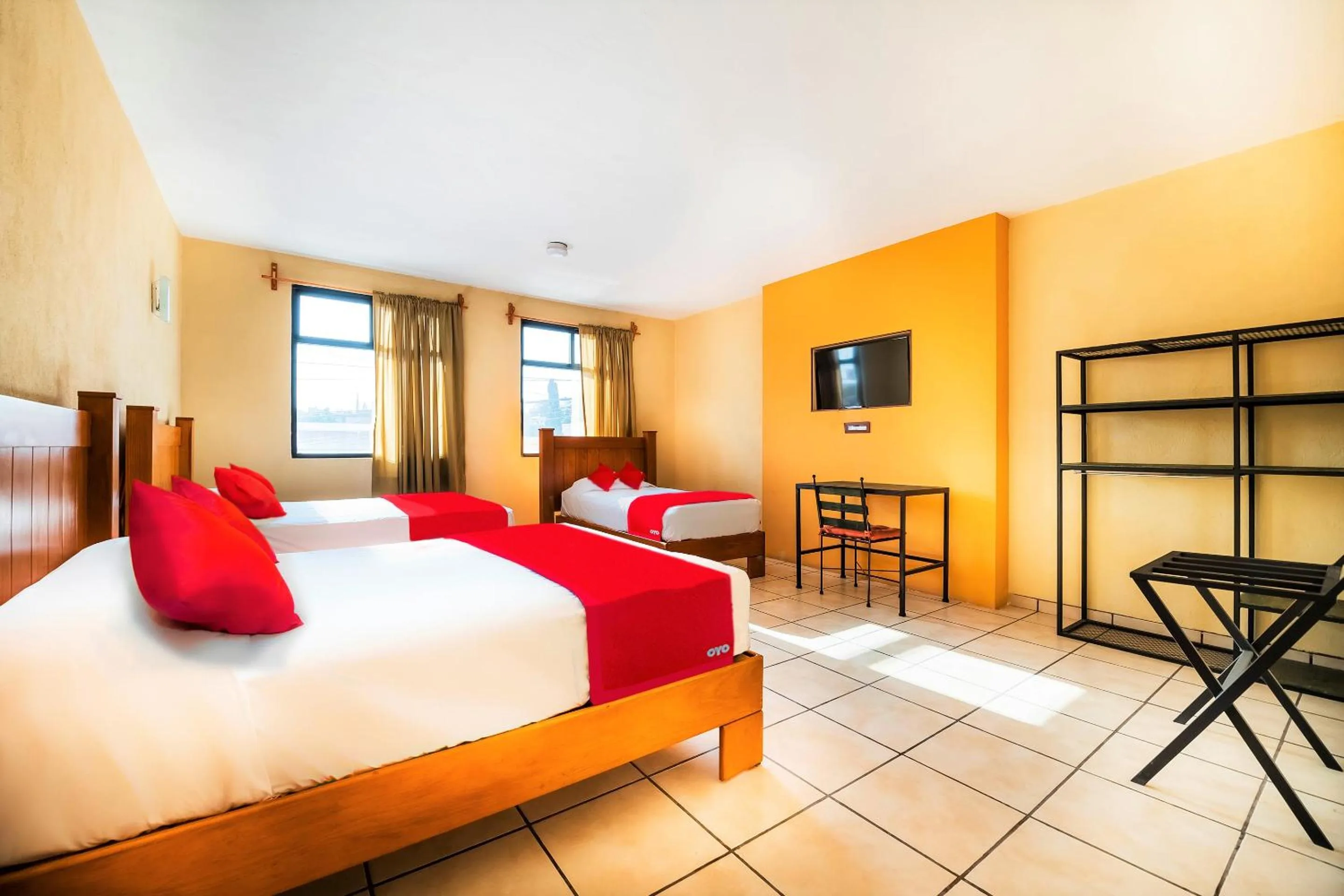 Bedroom in OYO Promenade