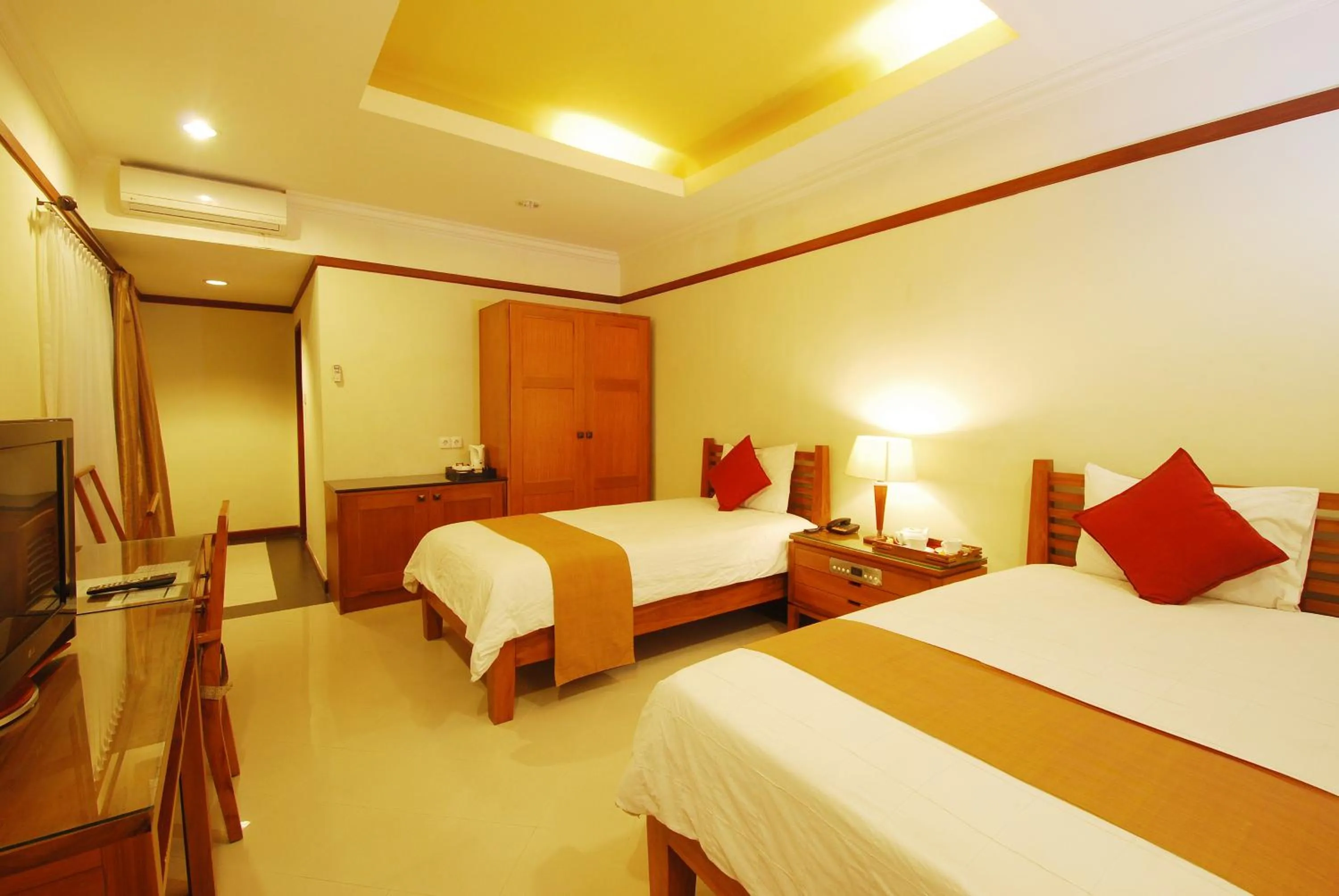 Photo of the whole room, Bed in Yulia Beach Inn Kuta