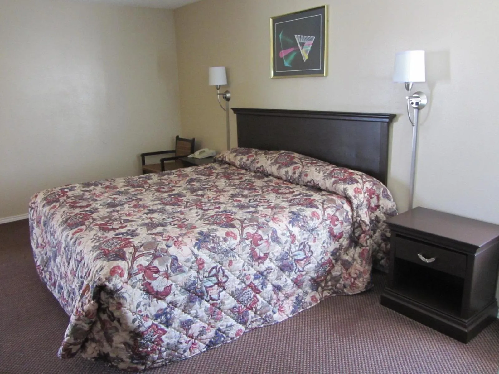 Bed in Super 8 by Wyndham Lubbock Civic Center North
