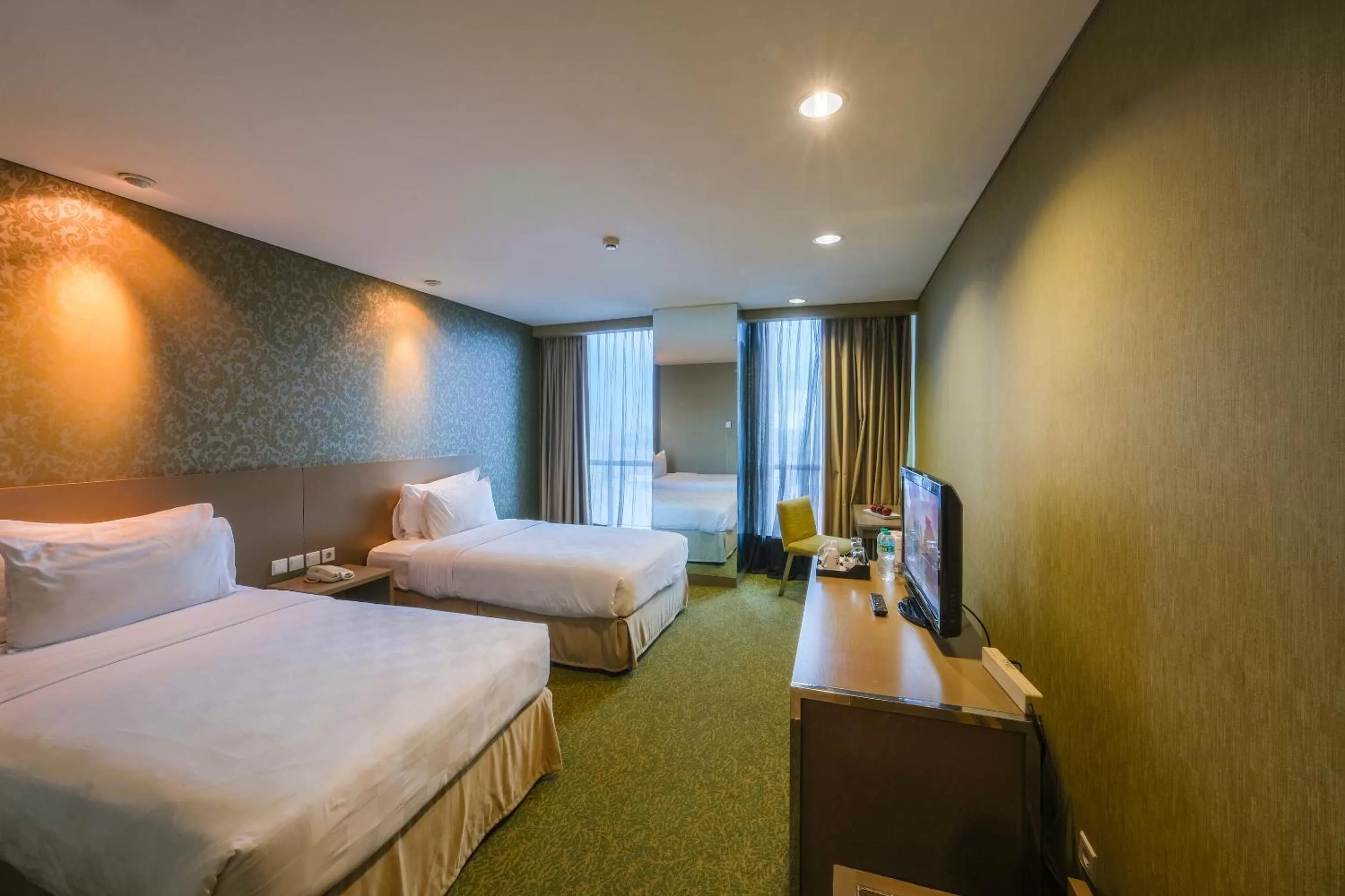 Bedroom in Swiss-Belhotel Mangga Besar