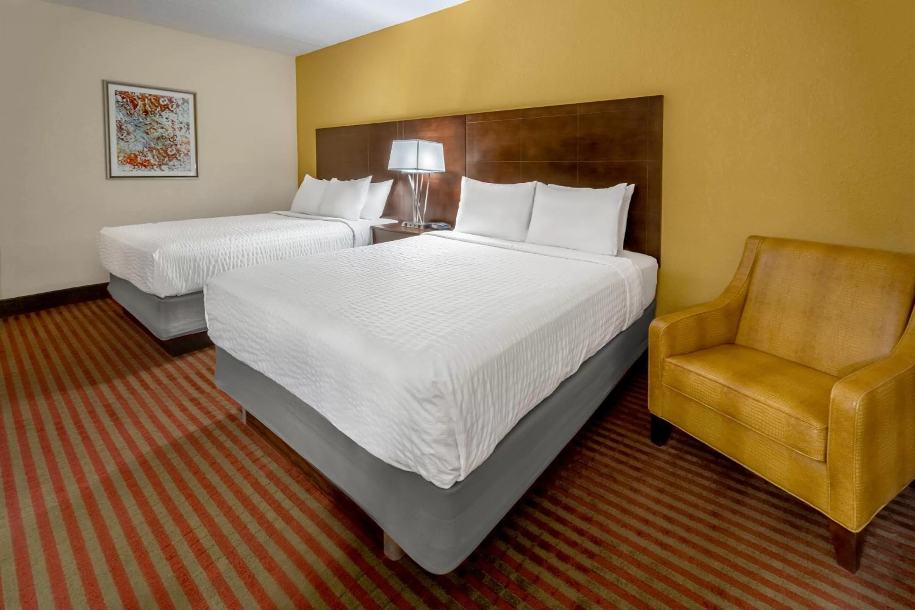 Bed in Grand Williston Hotel and Conference Center
