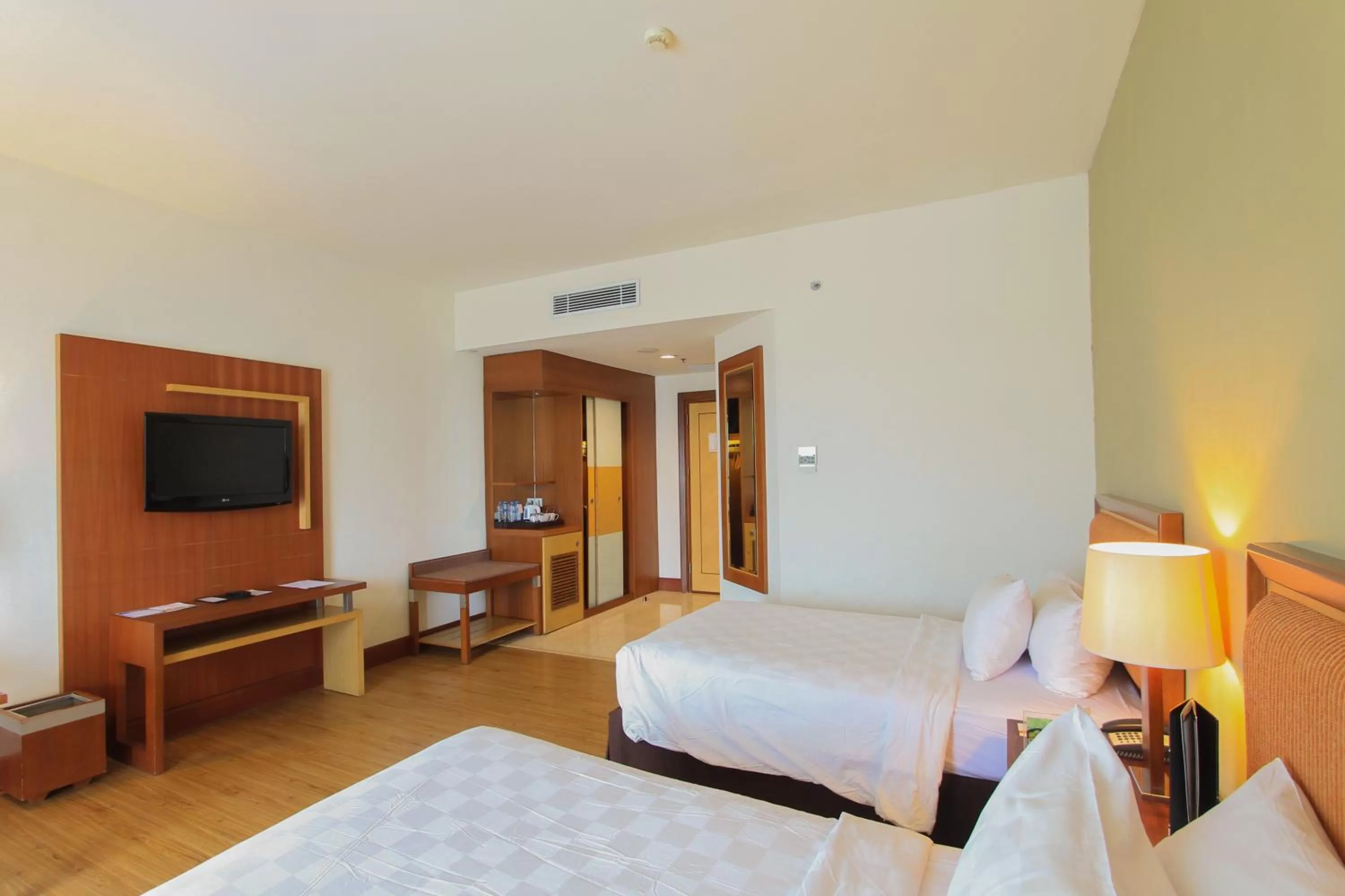 Photo of the whole room, Bed in Swiss-Belhotel Maleosan Manado