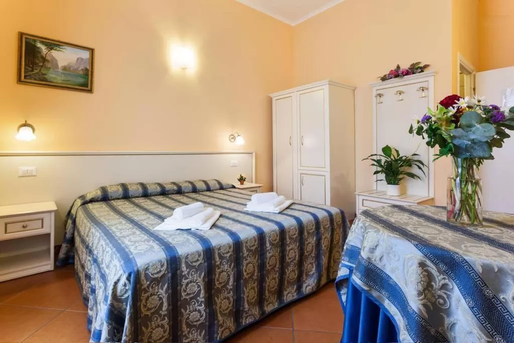 Photo of the whole room, Bed in Vatican Town