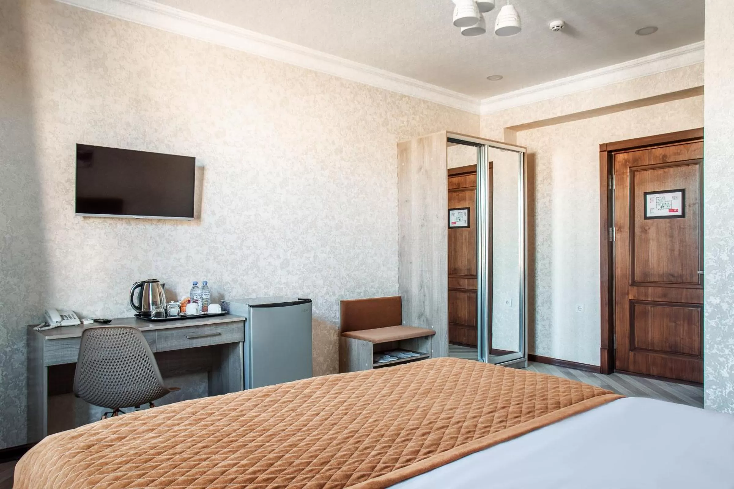 TV and multimedia, Bed in Manifa Hotel