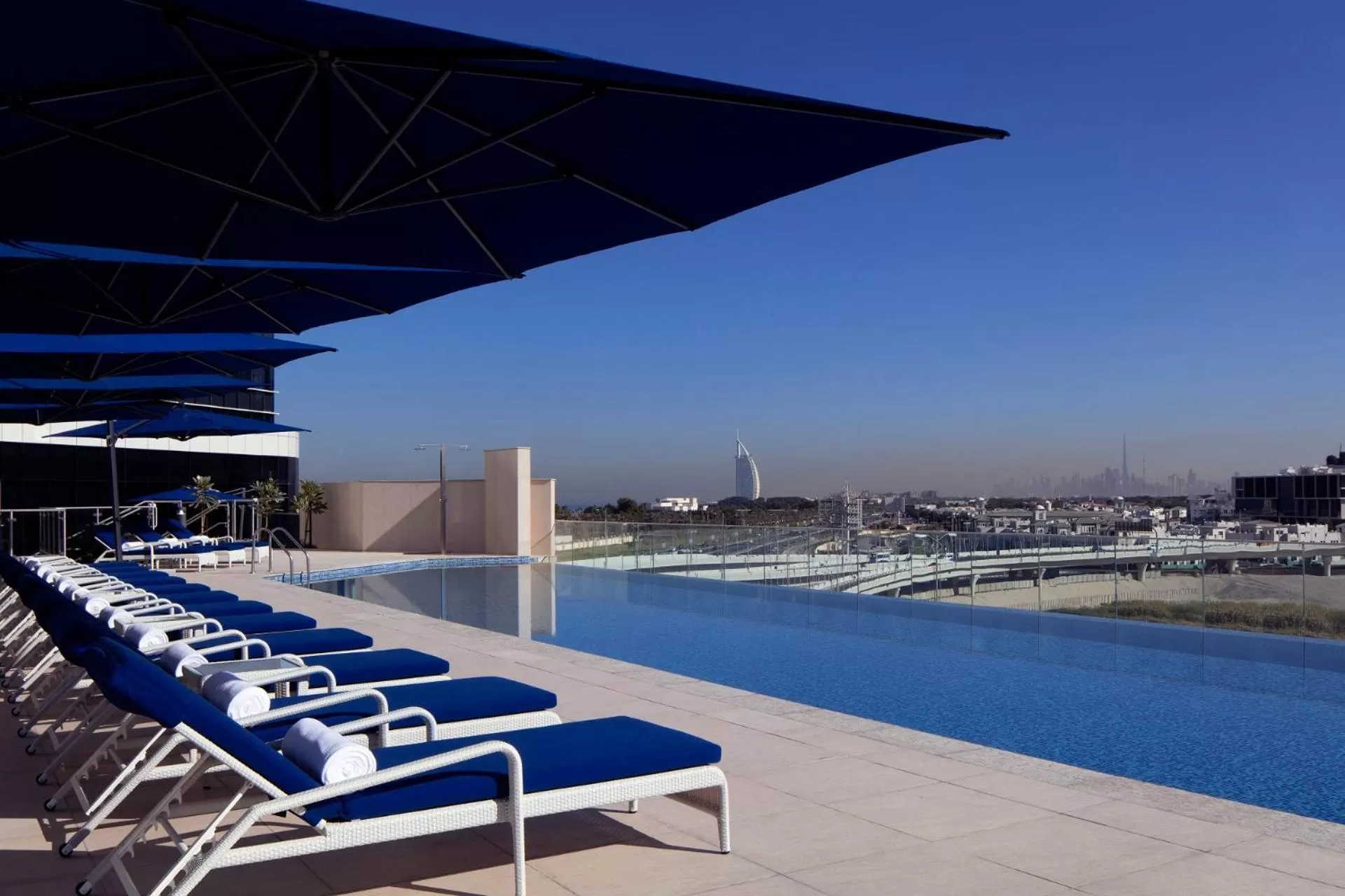 Swimming pool in Avani Plus Palm View Dubai Hotel & Suites