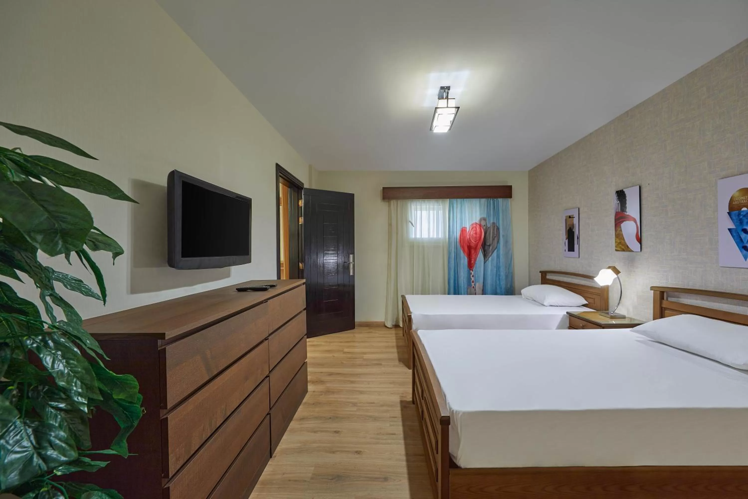 Communal lounge/ TV room, Bed in Golden Park Hotel Cairo, Heliopolis