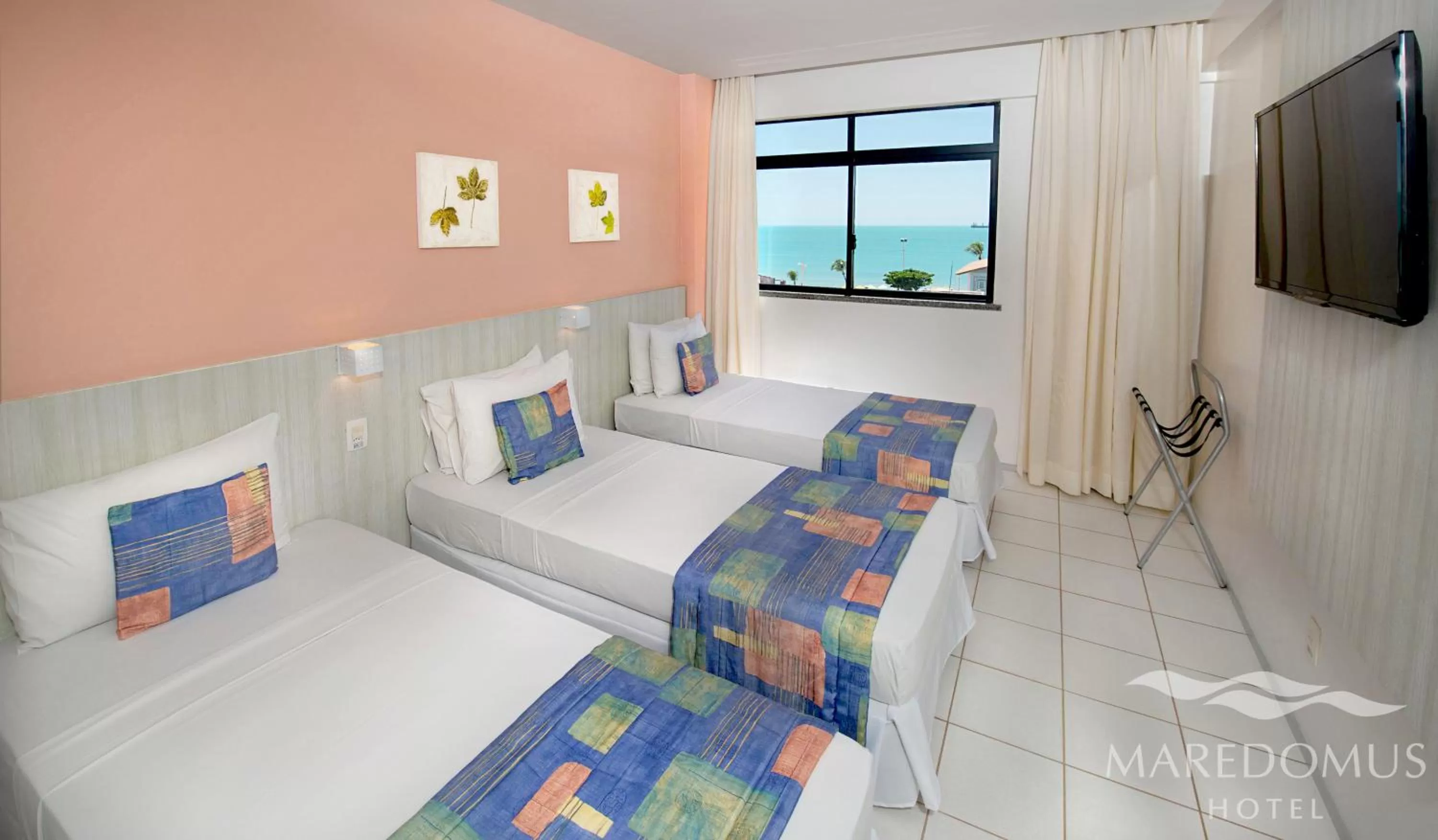 Bed in Maredomus Hotel