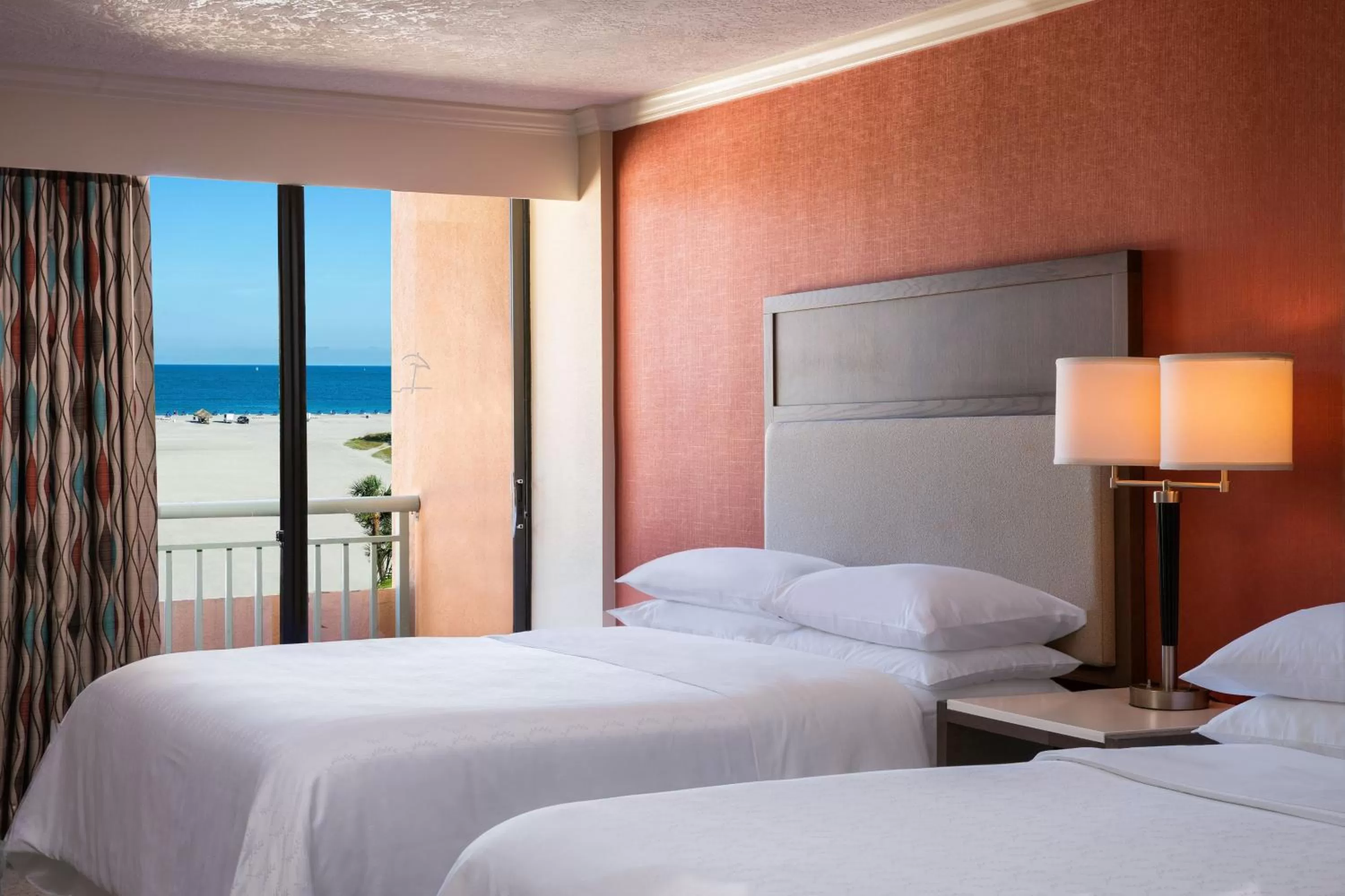 Guest room, 2 Queen, Gulf side, Poolside, Balcony in Sheraton Sand Key Resort
