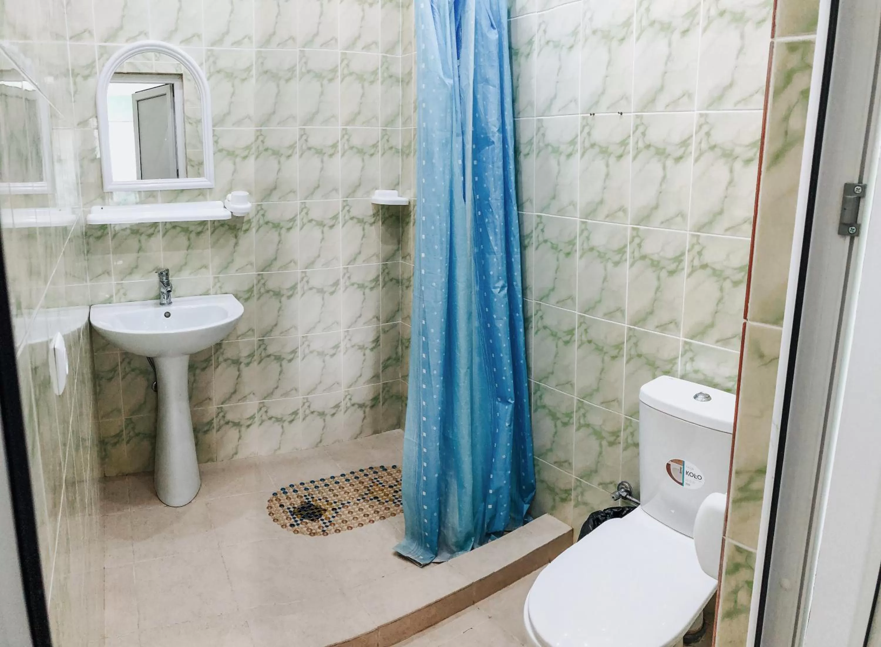 Bathroom in Zolotoy Bereg Hotel