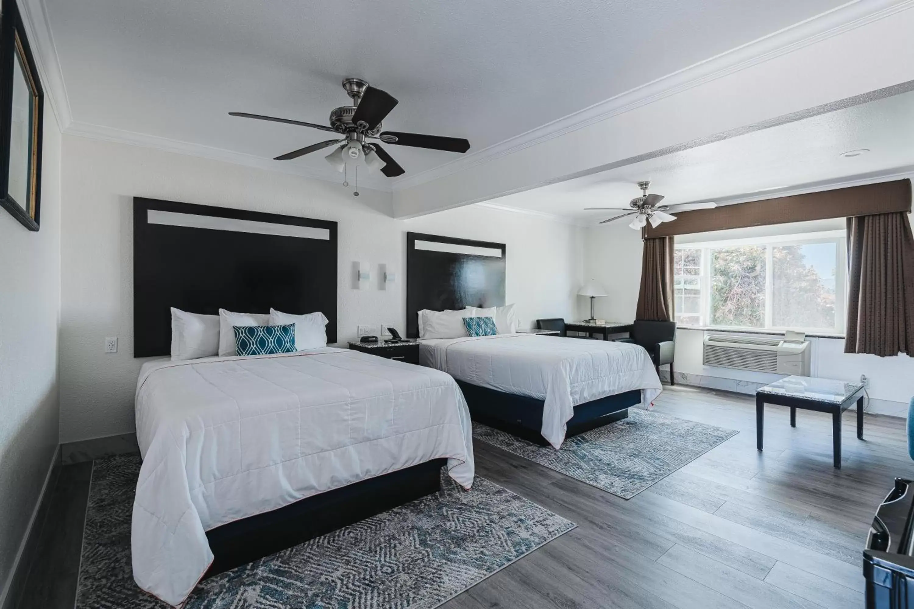 Deluxe Two Queen Bed Room Suite - Upstairs, Non-Smoking, No Pets in Sea Air Inn & Suites - Downtown - Restaurant Row Deluxe Two Queen Bed Room Suite - Upstairs, Non-Smoking, No Pets in Sea Air Inn & Suites - Downtown - Restaurant Row