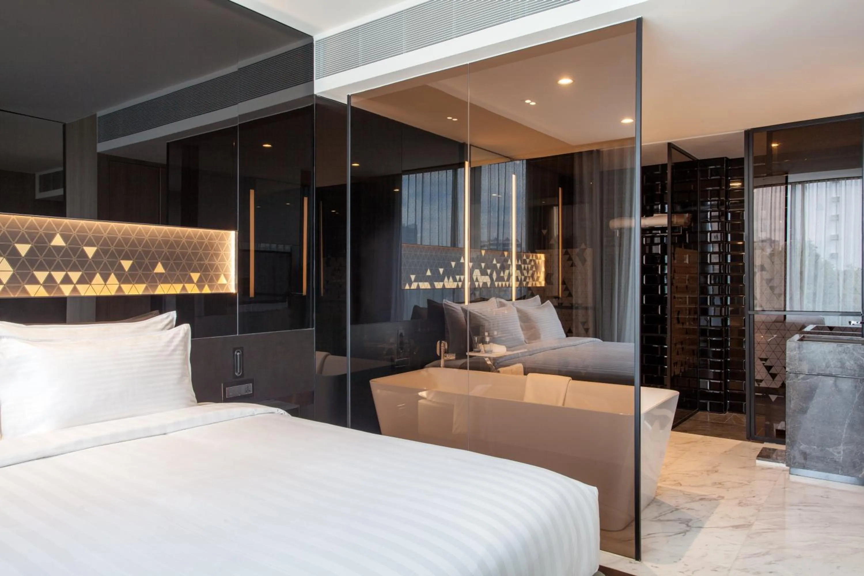 Bathroom, Bed in Novotel Singapore On Stevens