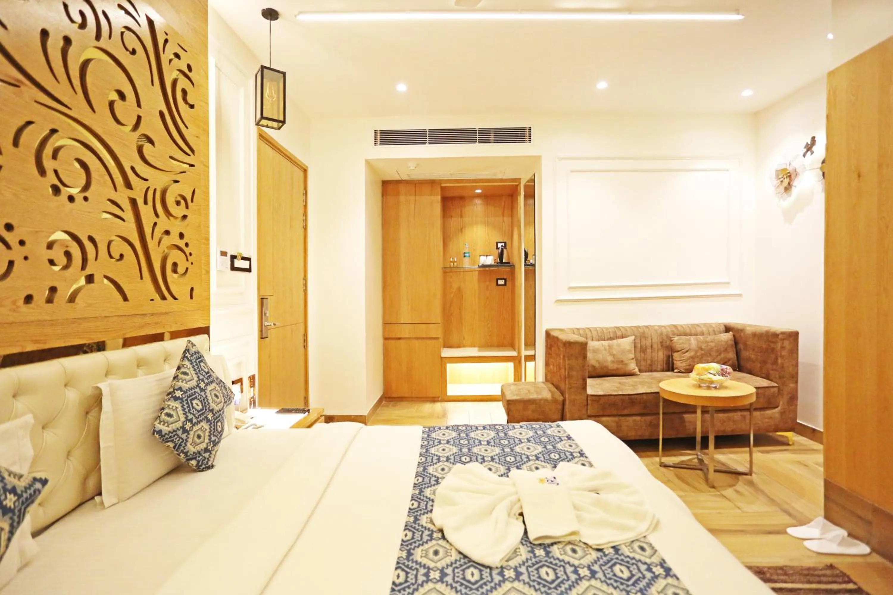 Bed in JRD Luxury-Business Hotel