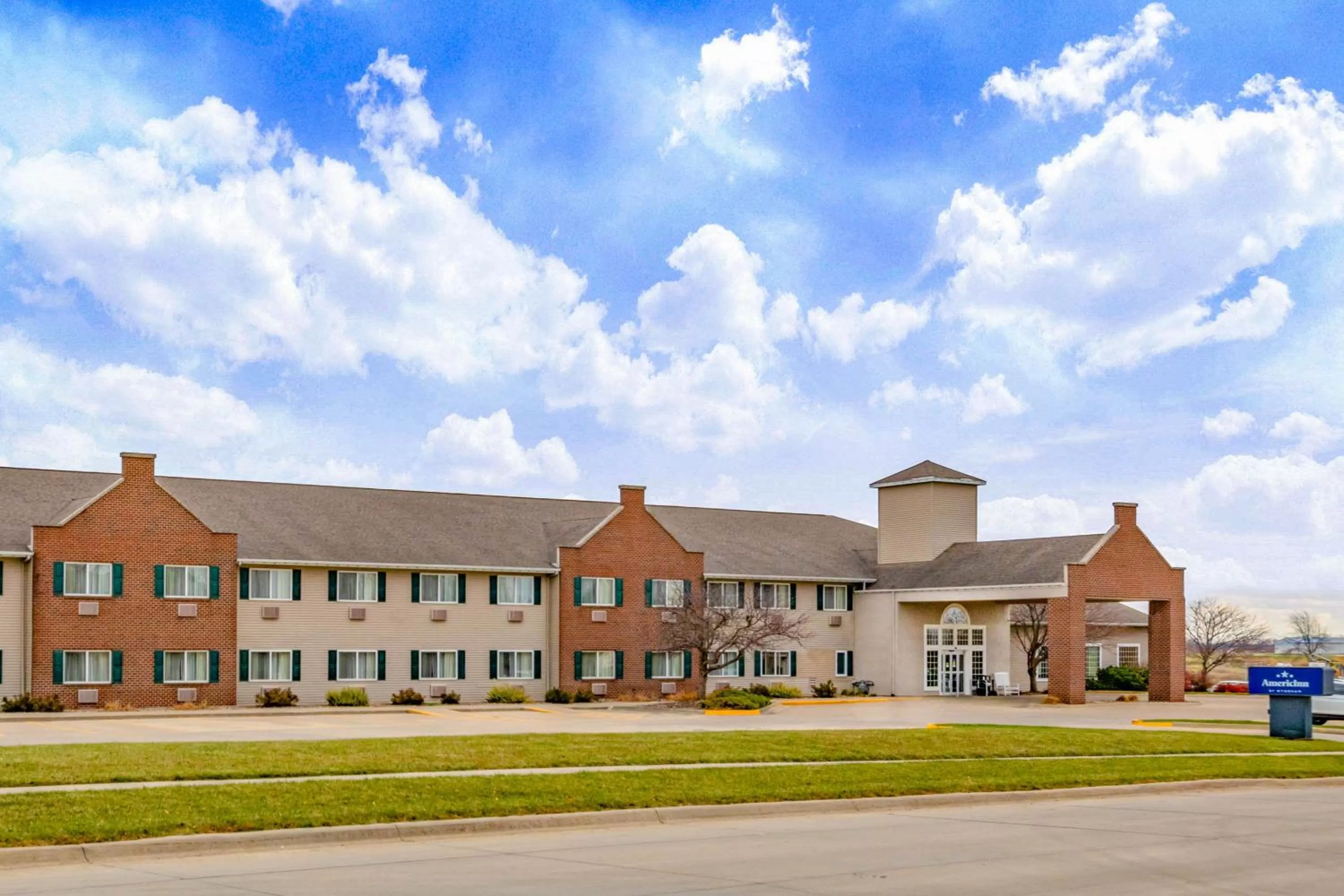 Property building in AmericInn by Wyndham Pella