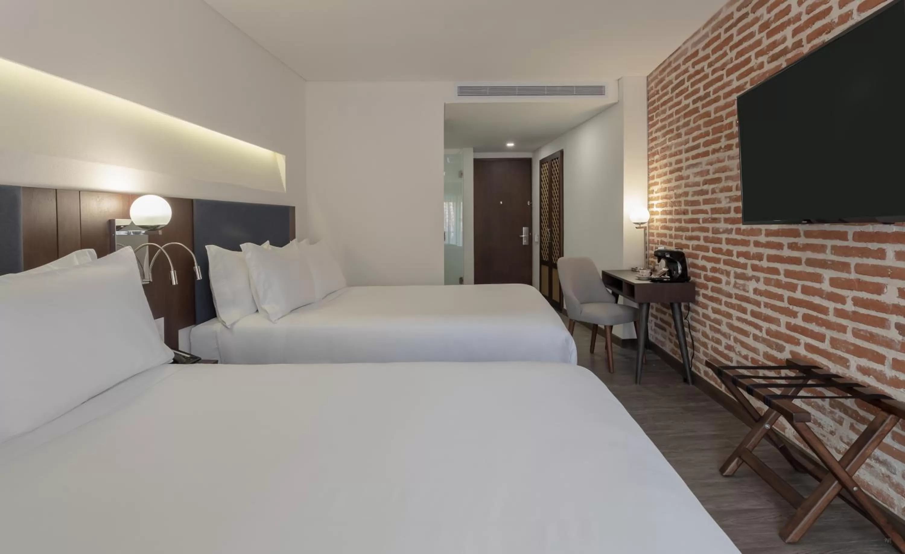 Photo of the whole room, Bed in Hotel Santa Catalina By OxoHotel