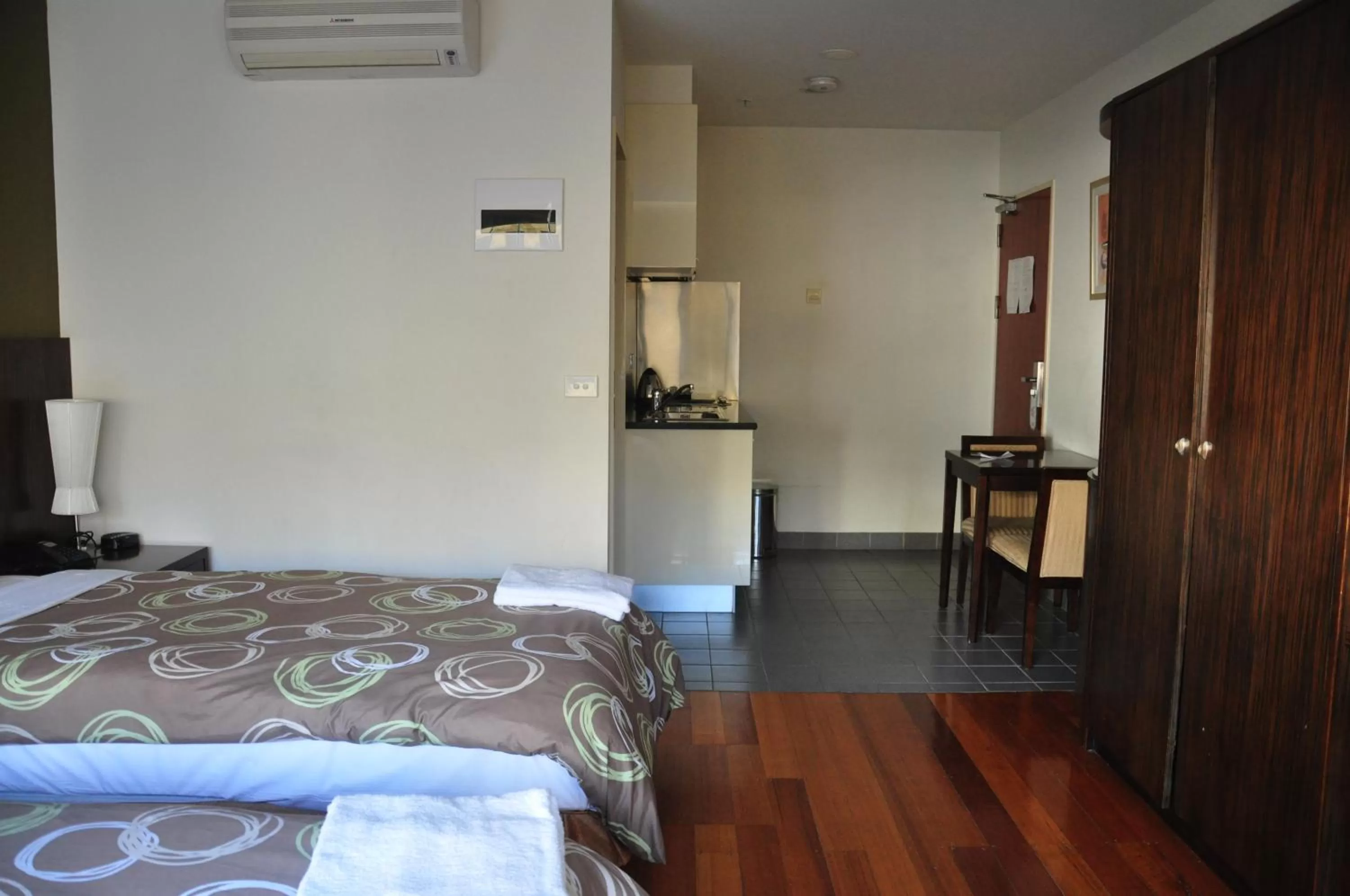 Bed in YTI Garden Hotel