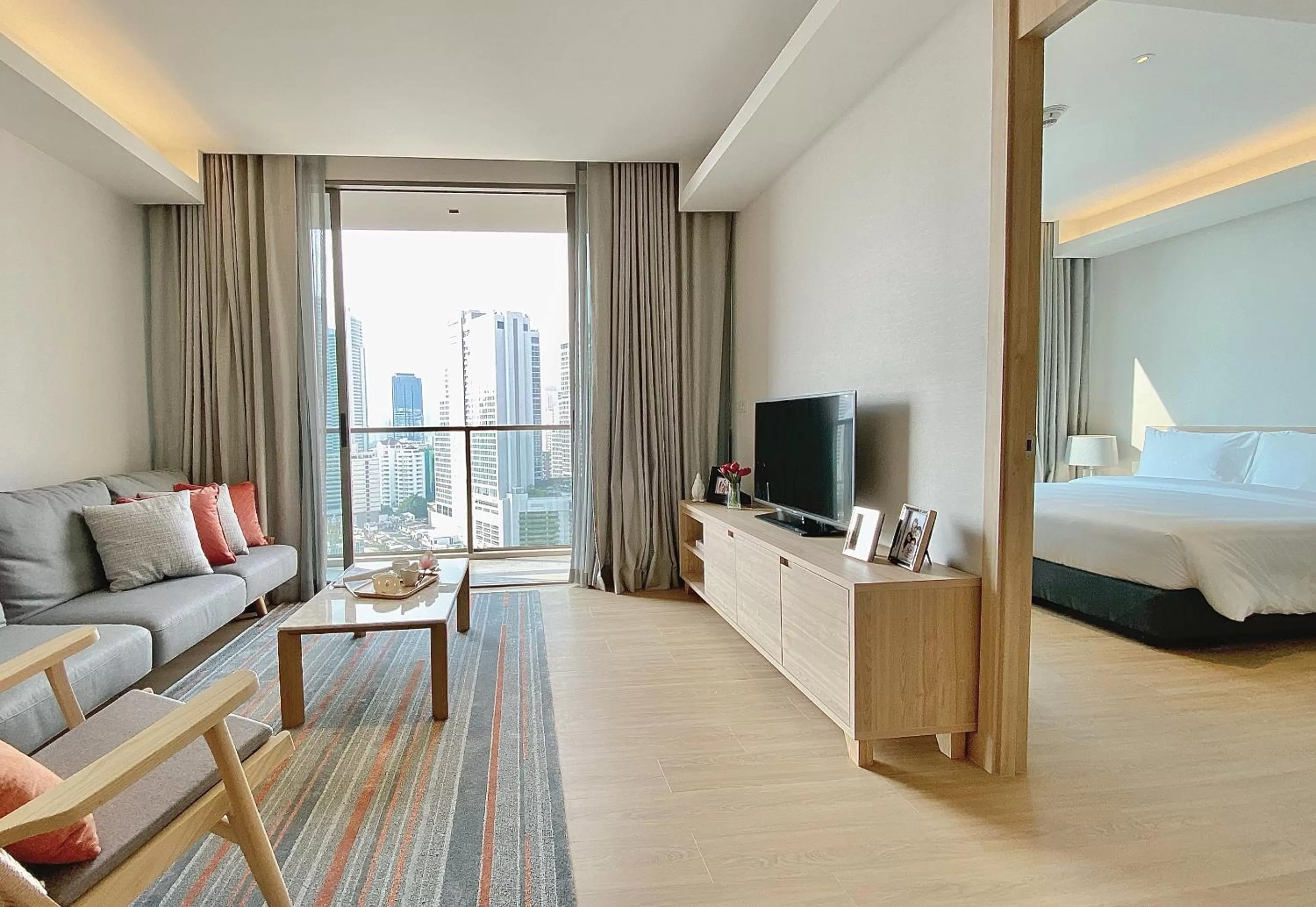 TV and multimedia, Bed in Oakwood Suites Bangkok