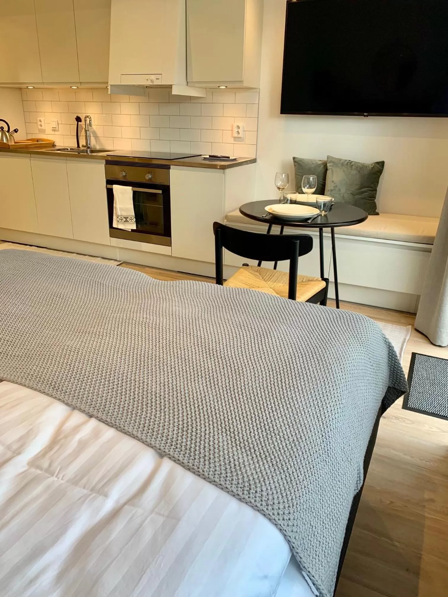 Bed in Easy Livin' Apartment Hotel