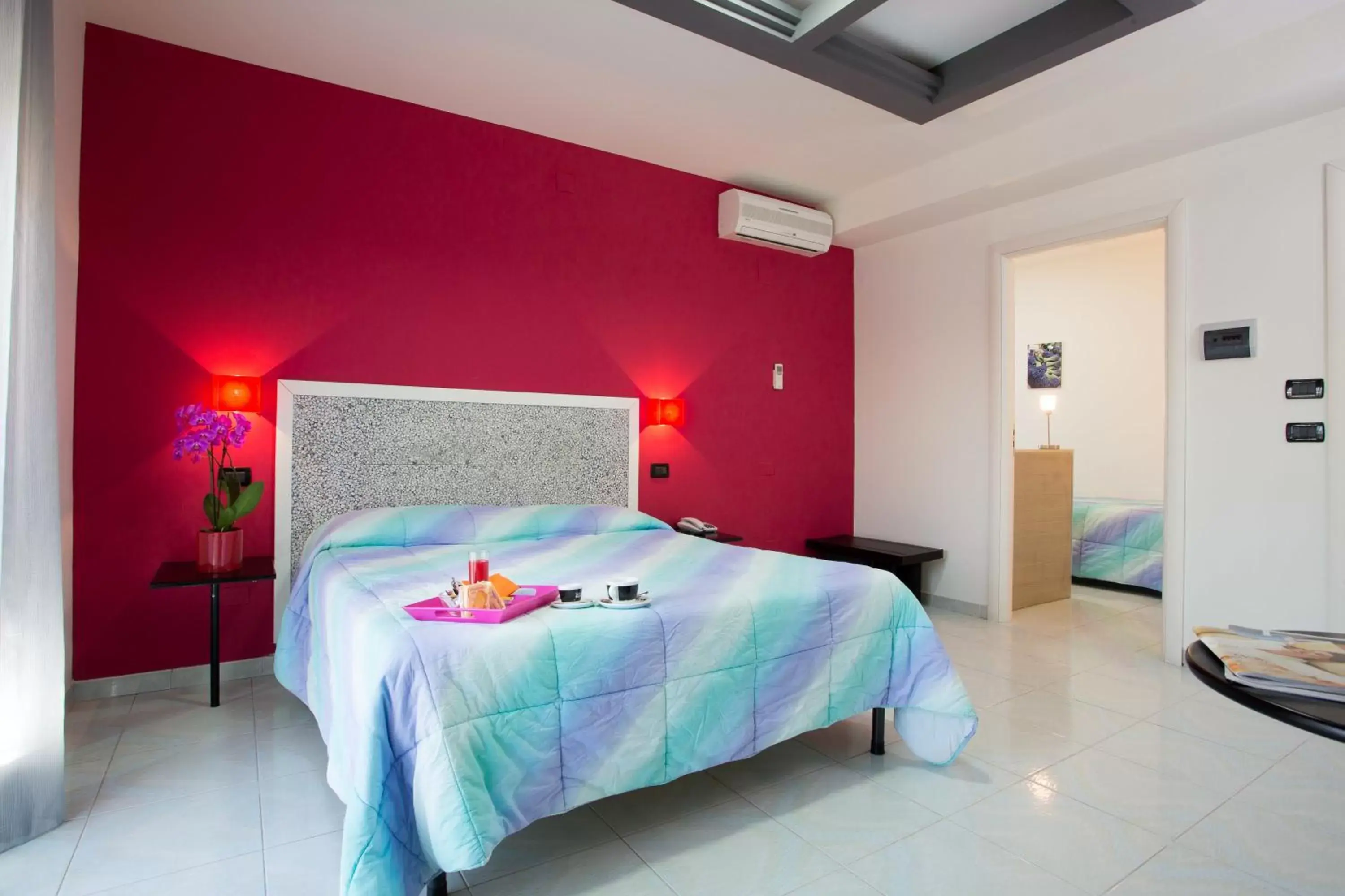 Quadruple Room in Hotel Le Ceramiche Quadruple Room in Hotel Le Ceramiche