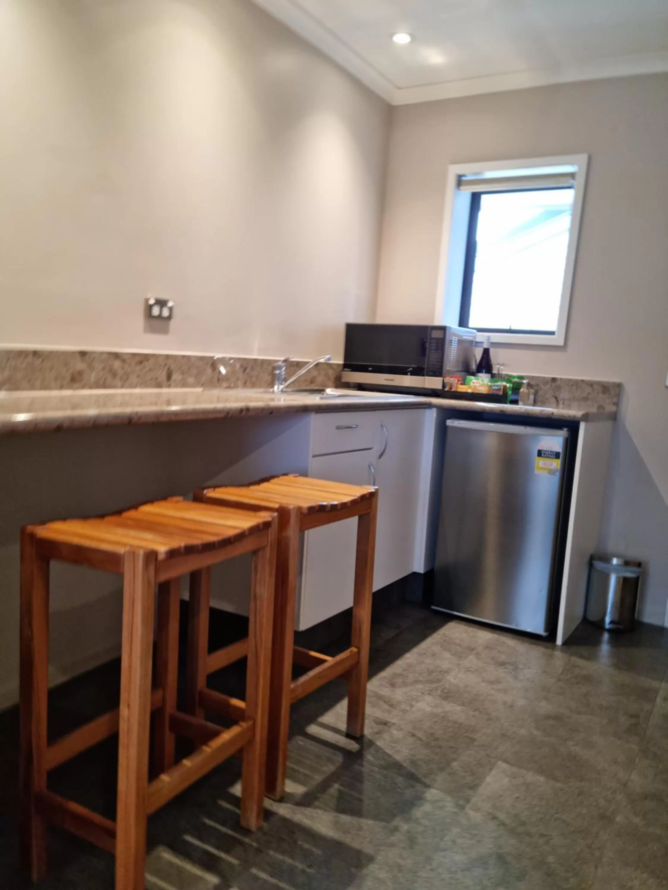 Kitchen or kitchenette in Paroa Hotel