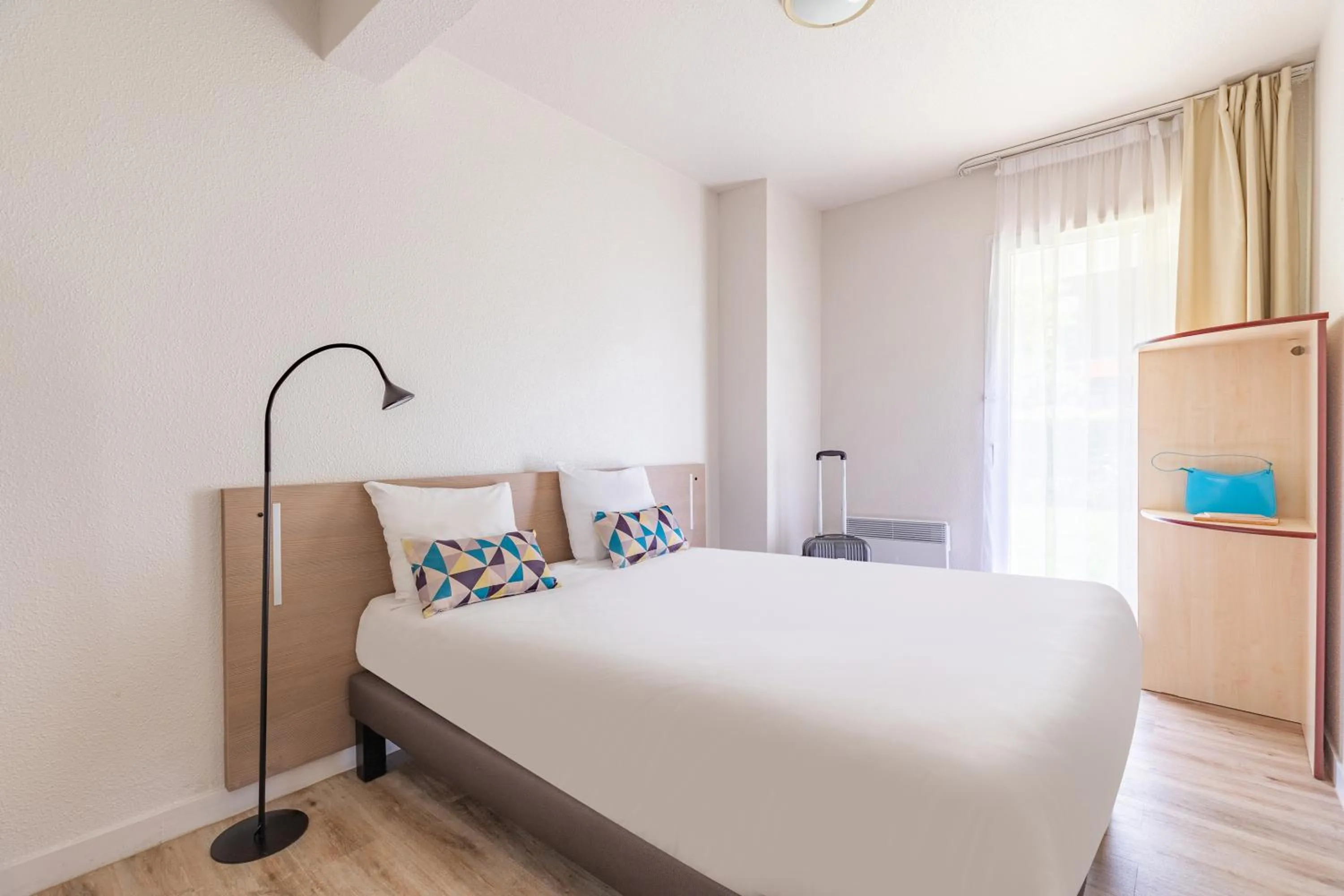 Bed in Appart'City Classic Rennes Ouest