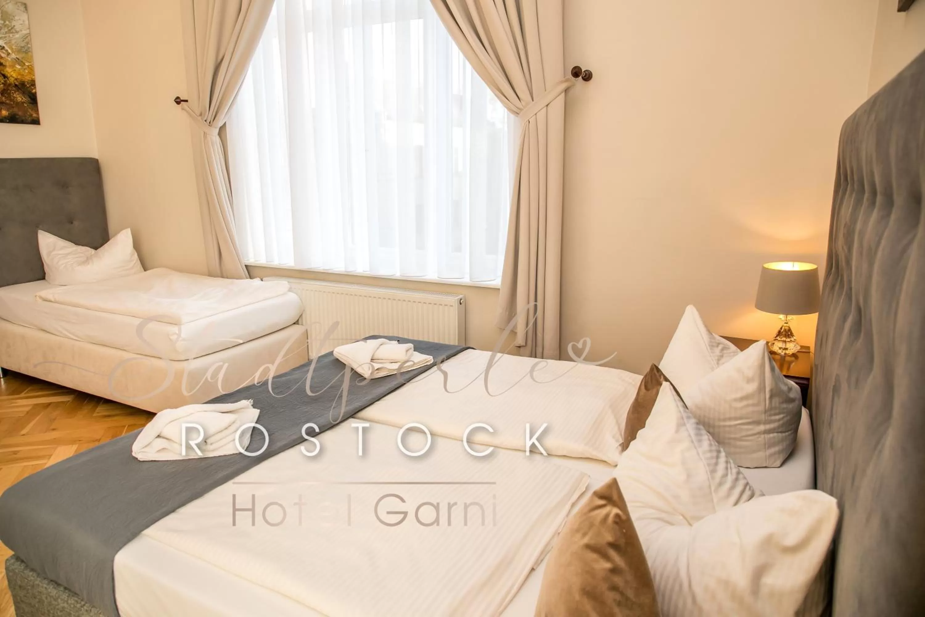 Photo of the whole room, Bed in Stadtperle Rostock