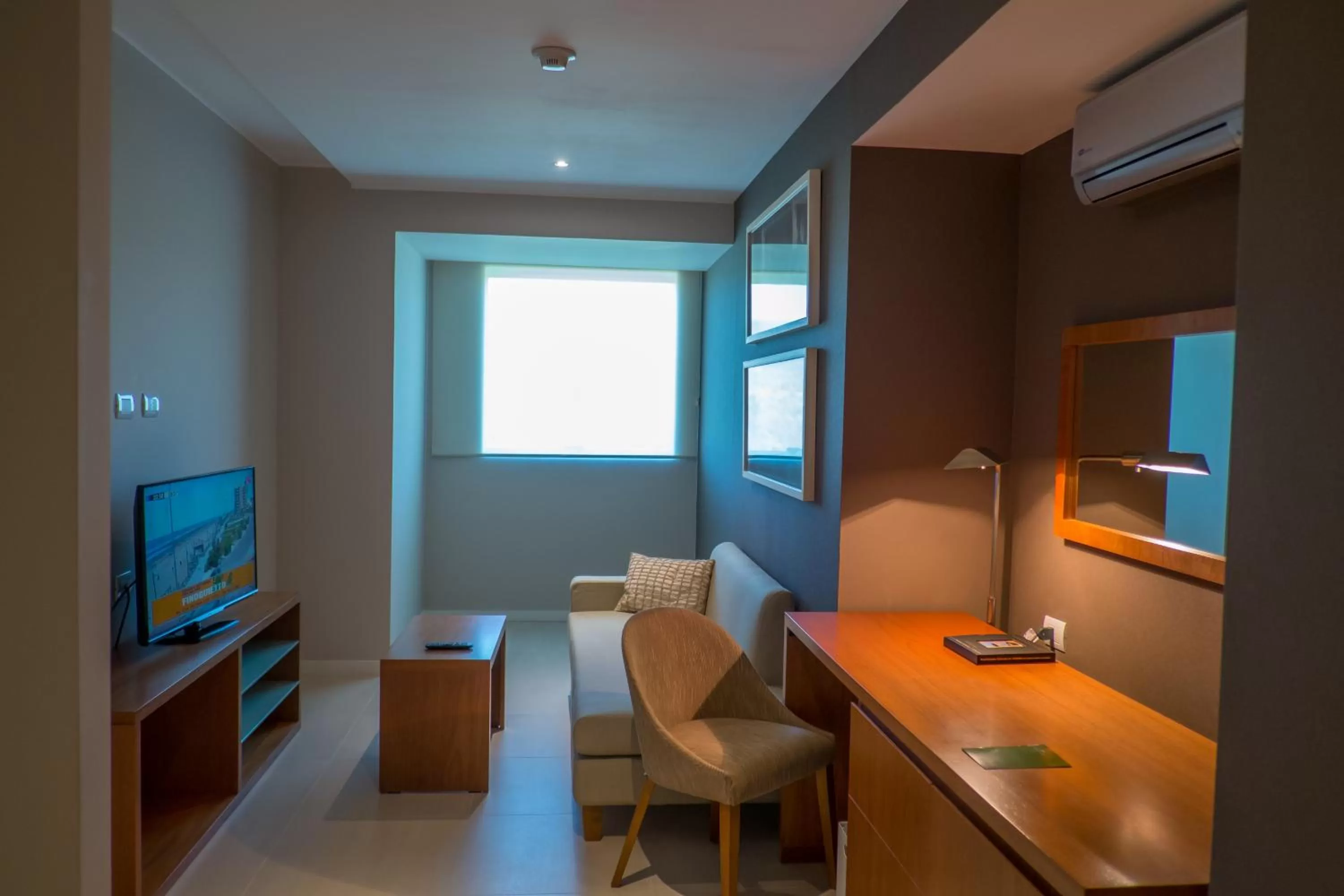 Communal lounge/ TV room in Orfeo Suites Hotel Sierras Chicas