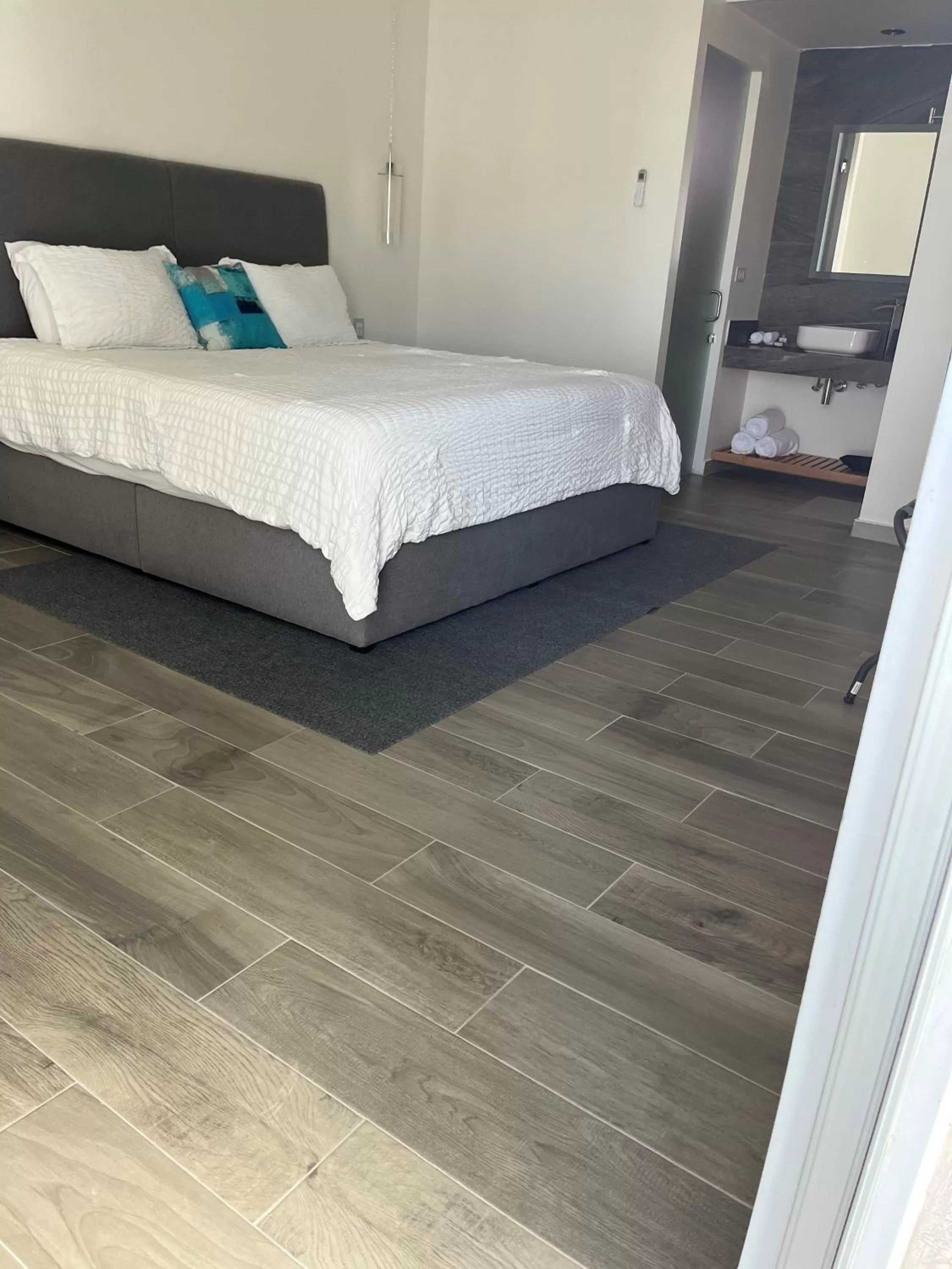 Bed in The Cove Boutique Hotel Adults Only