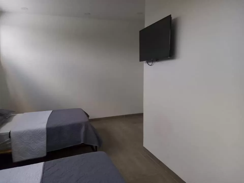 Photo of the whole room, TV/Entertainment Center in Hotel La Aldea del Oriente