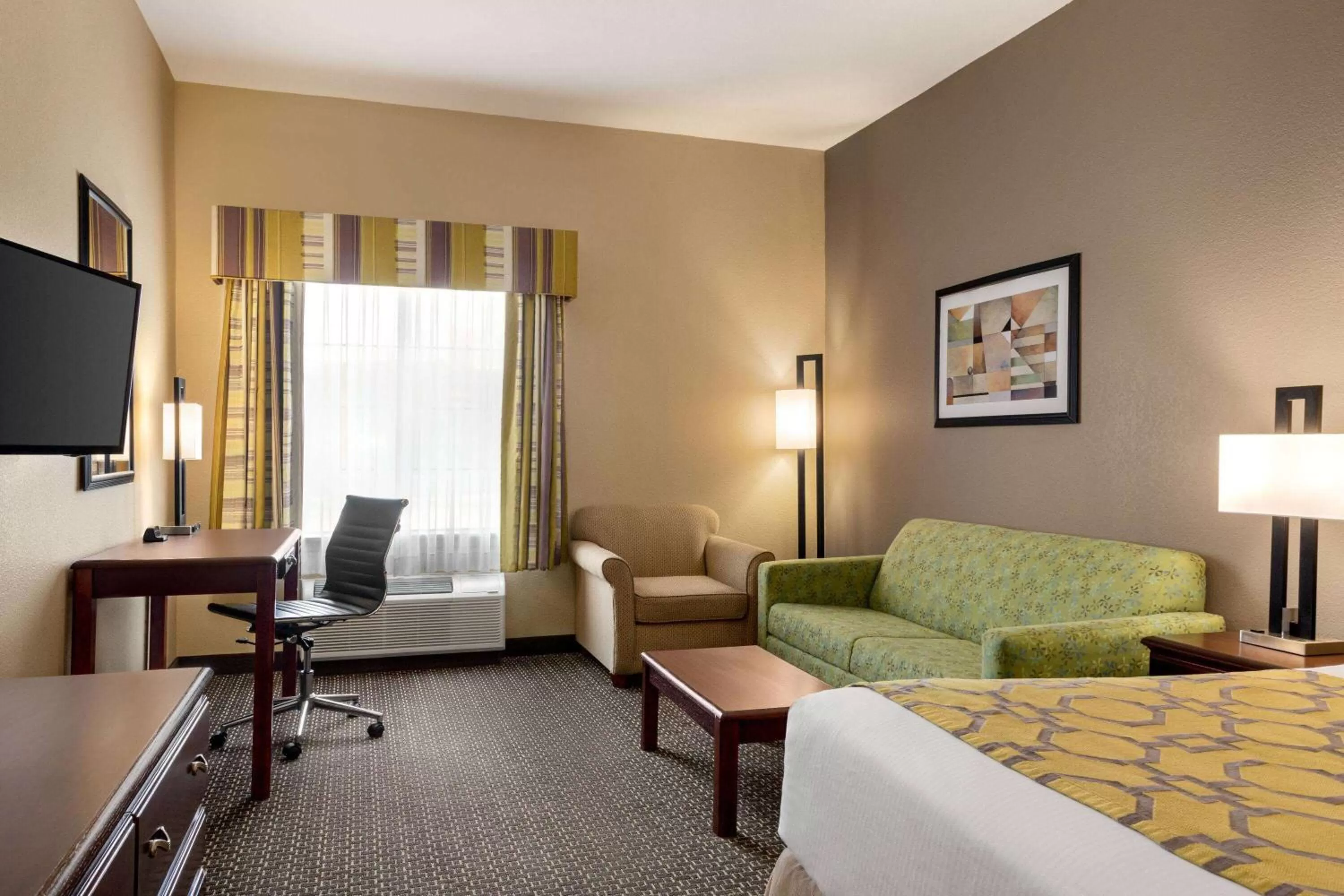 Photo of the whole room, Bed in Baymont by Wyndham Wichita Falls