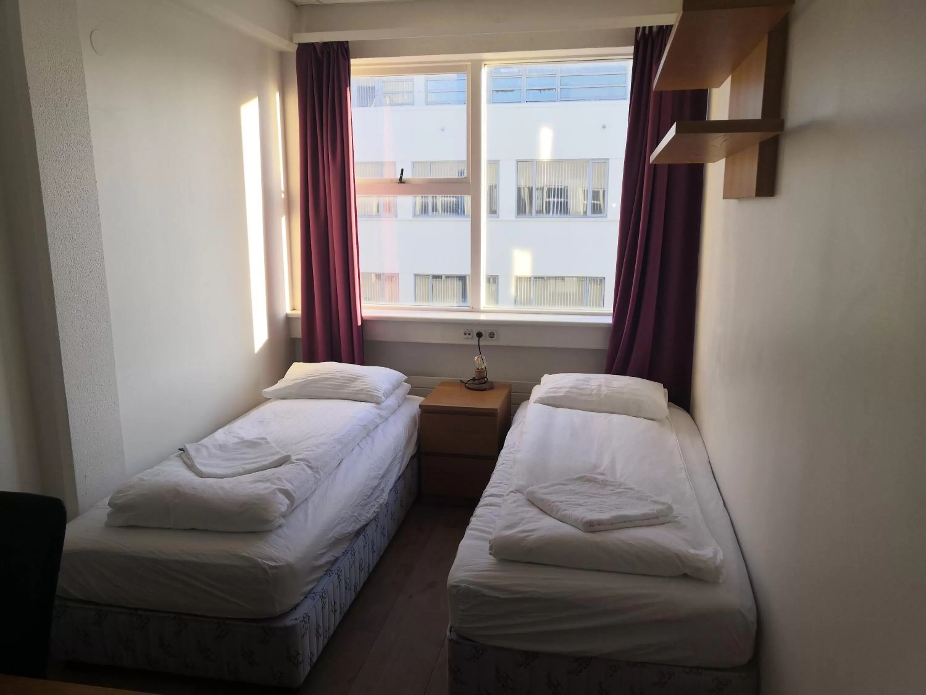 Bed in 101 Guesthouse Hotel