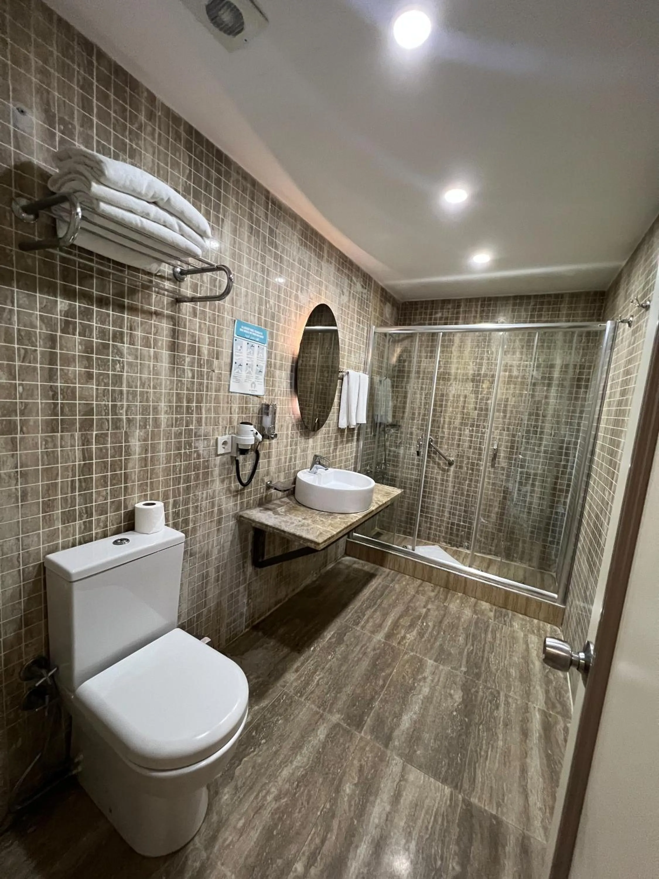 Toilet in All Seasons Hotel