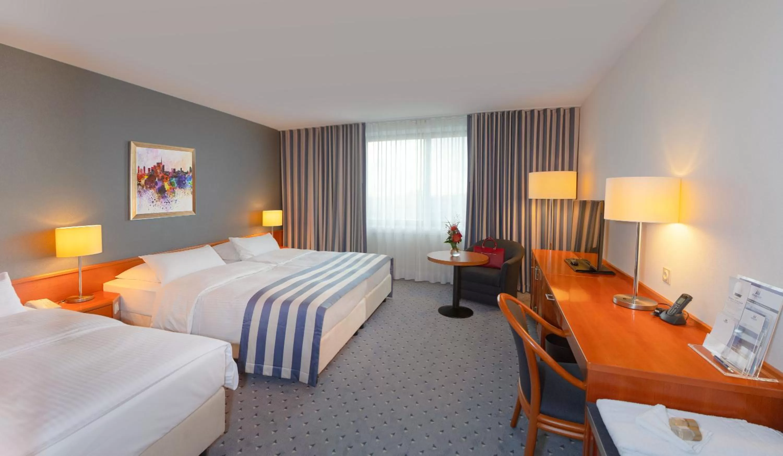 Photo of the whole room, Bed in Maritim Hotel Ulm