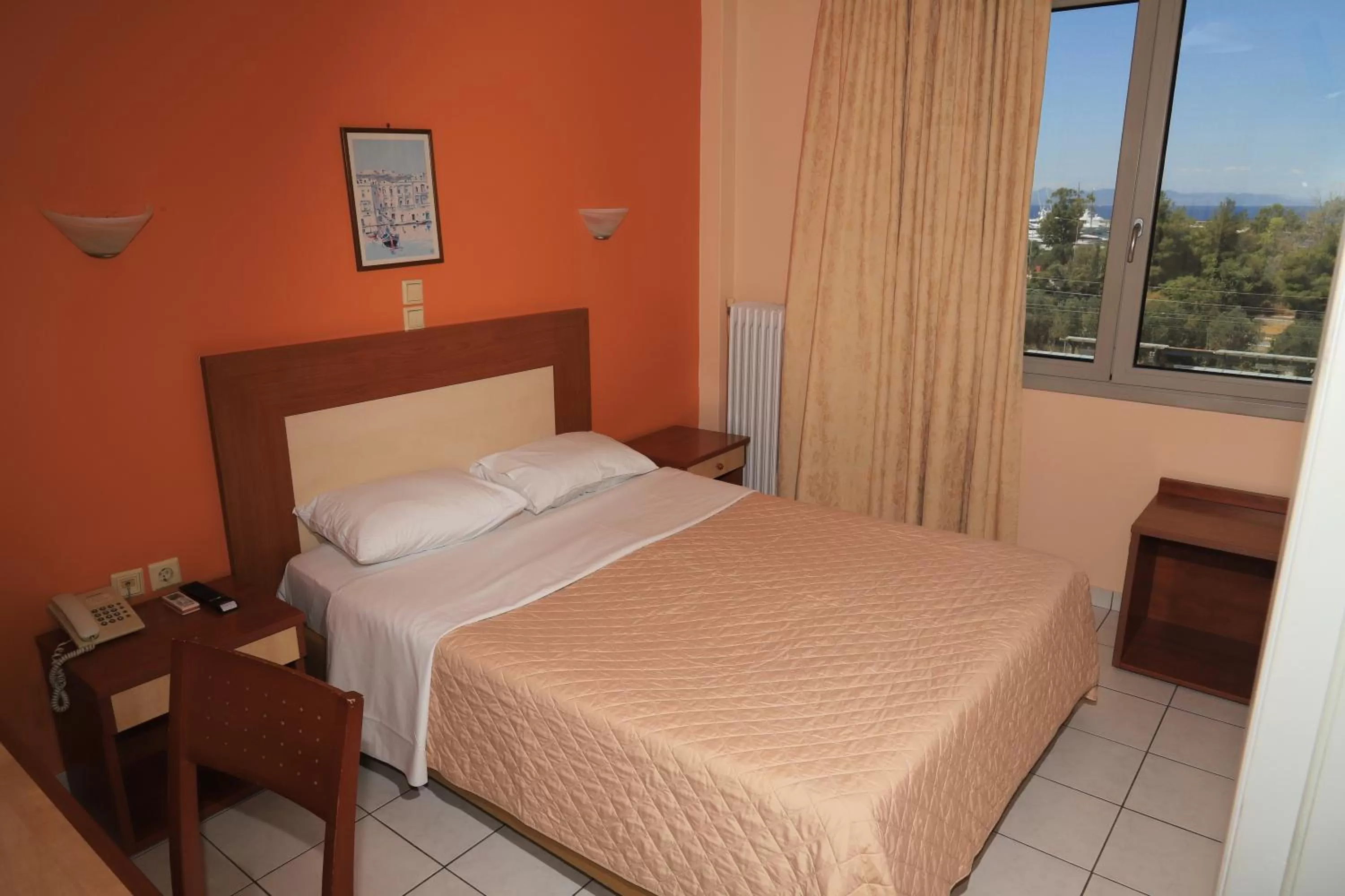 Bed in IKAROS Hotel ELLINIKO