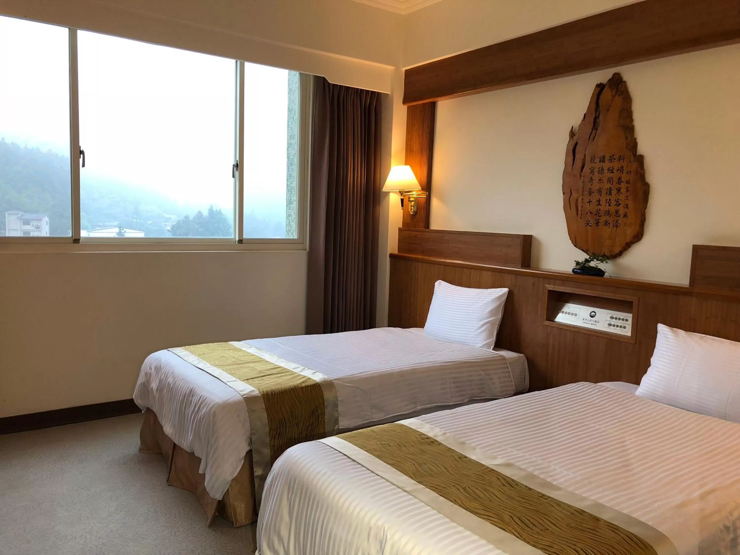 Decorative detail, Bed in Ginkgo Hotel