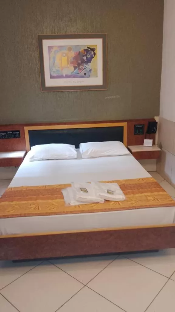 Bed in Hotel Smart Inn