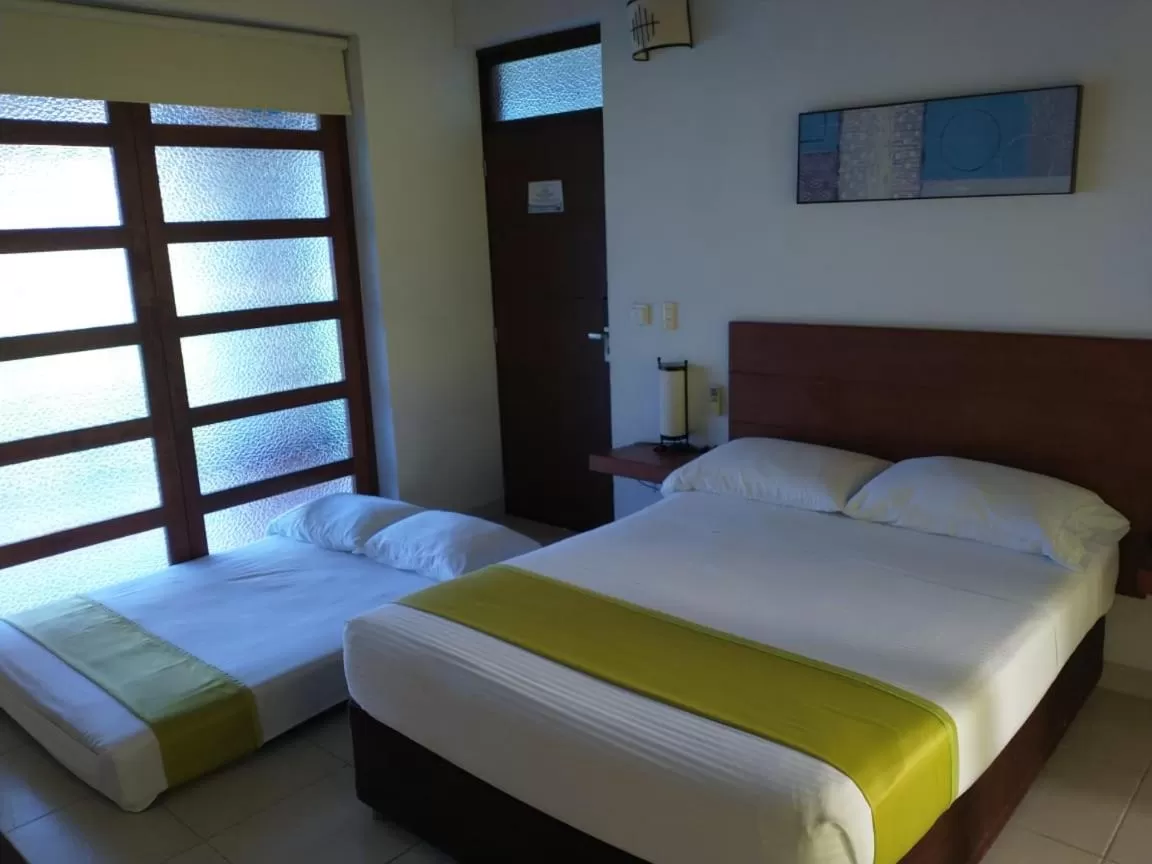 Bed in Brizantha Hotel Campestre