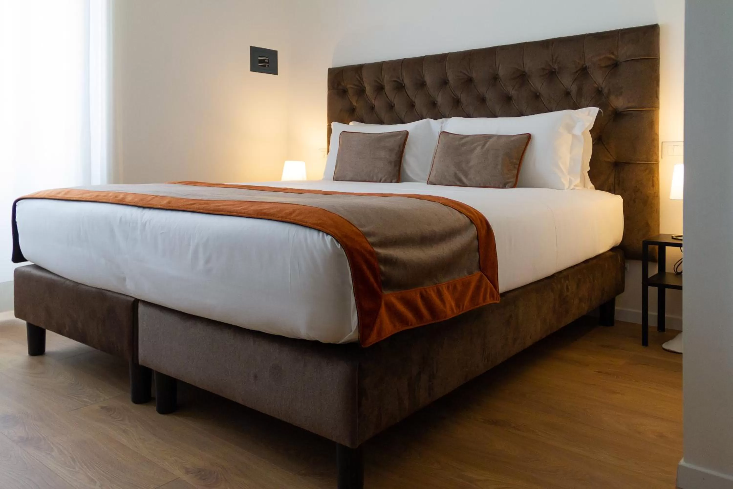 Bed in Michelangelo Vatican Rooms