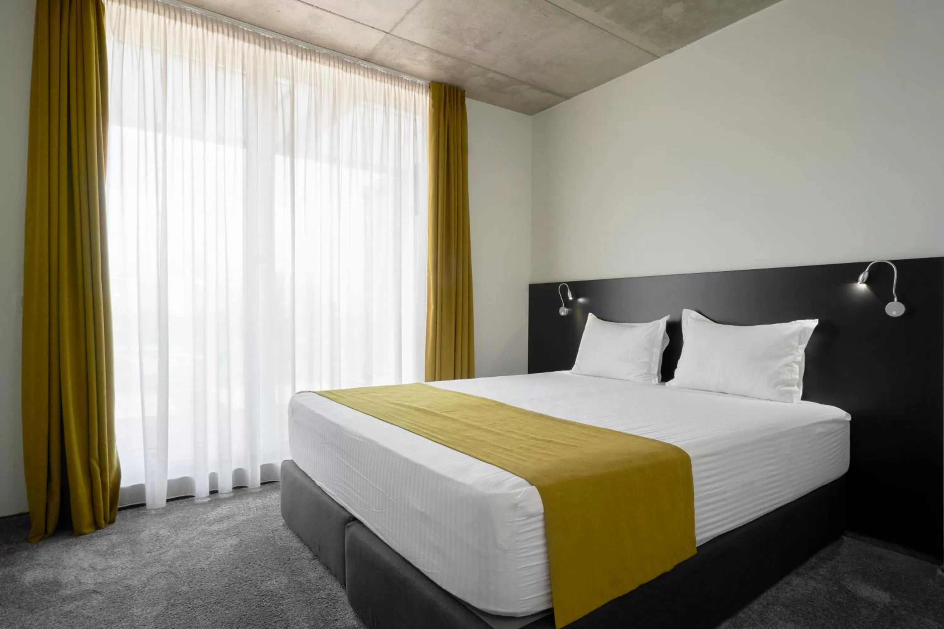 Bed in Adella Boutique Hotel - Free Secured Parking