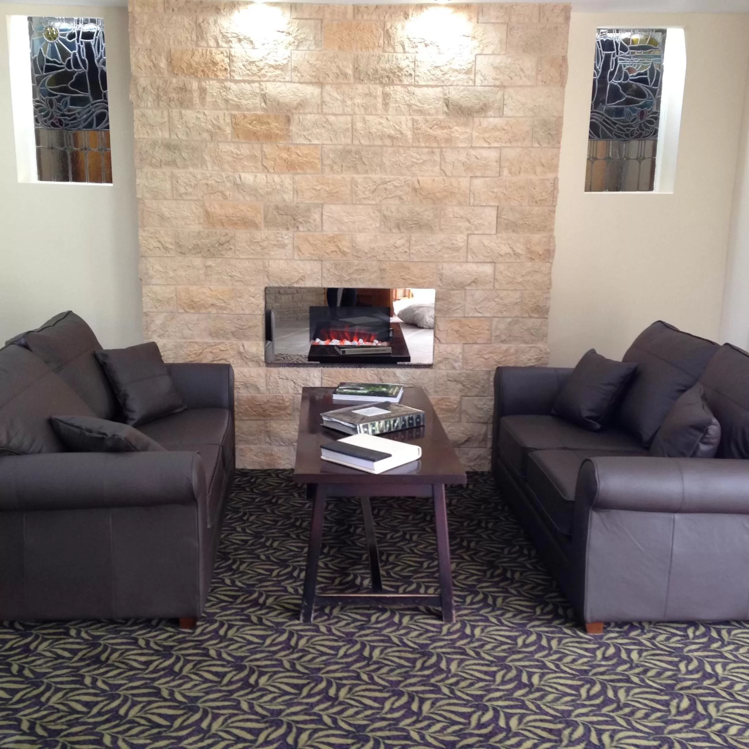 Communal lounge/ TV room in Best Western Bolholt Country Park Hotel