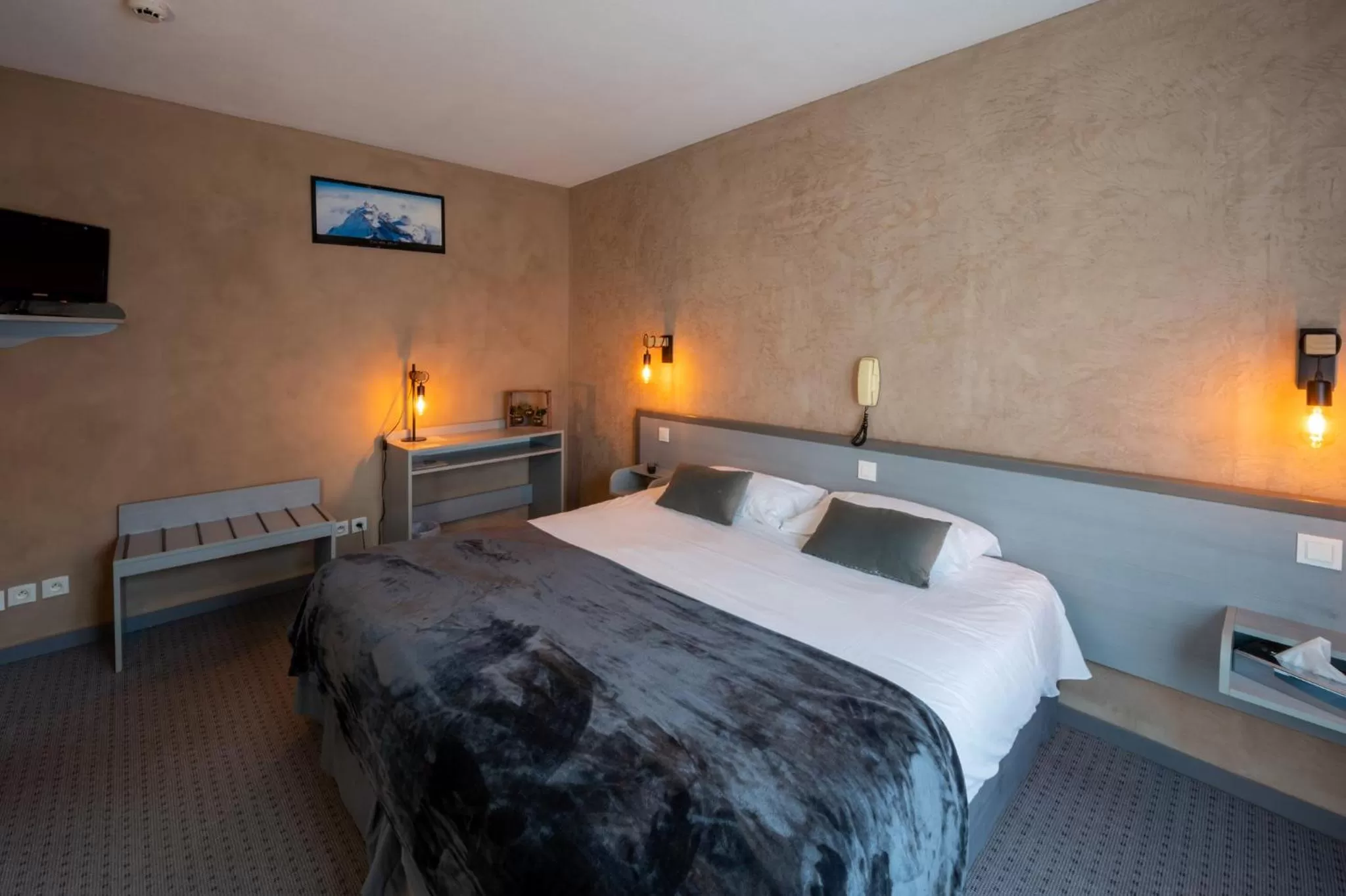 Bed in Hôtel du Soleil Levant