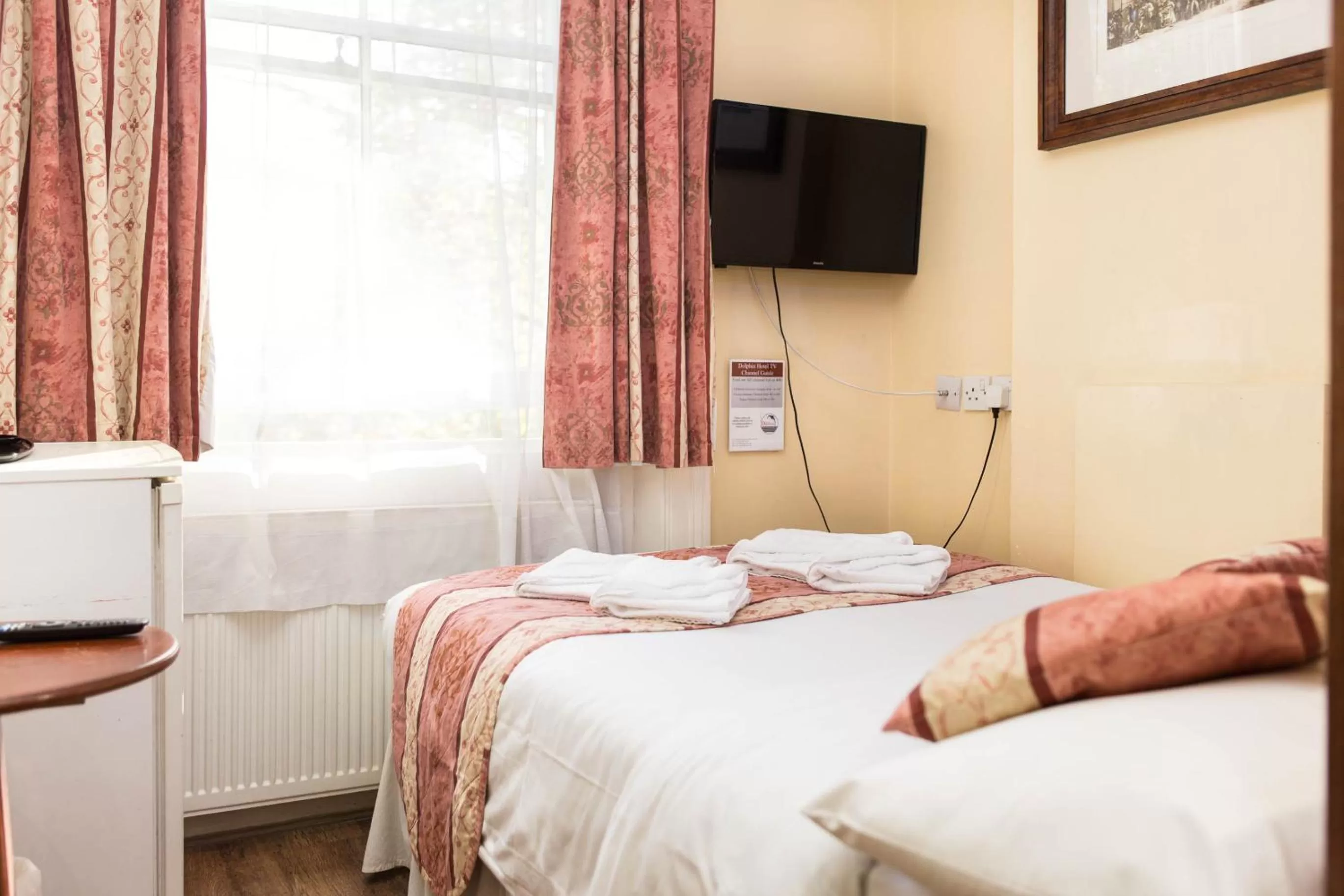 Bed in Dolphin Hotel