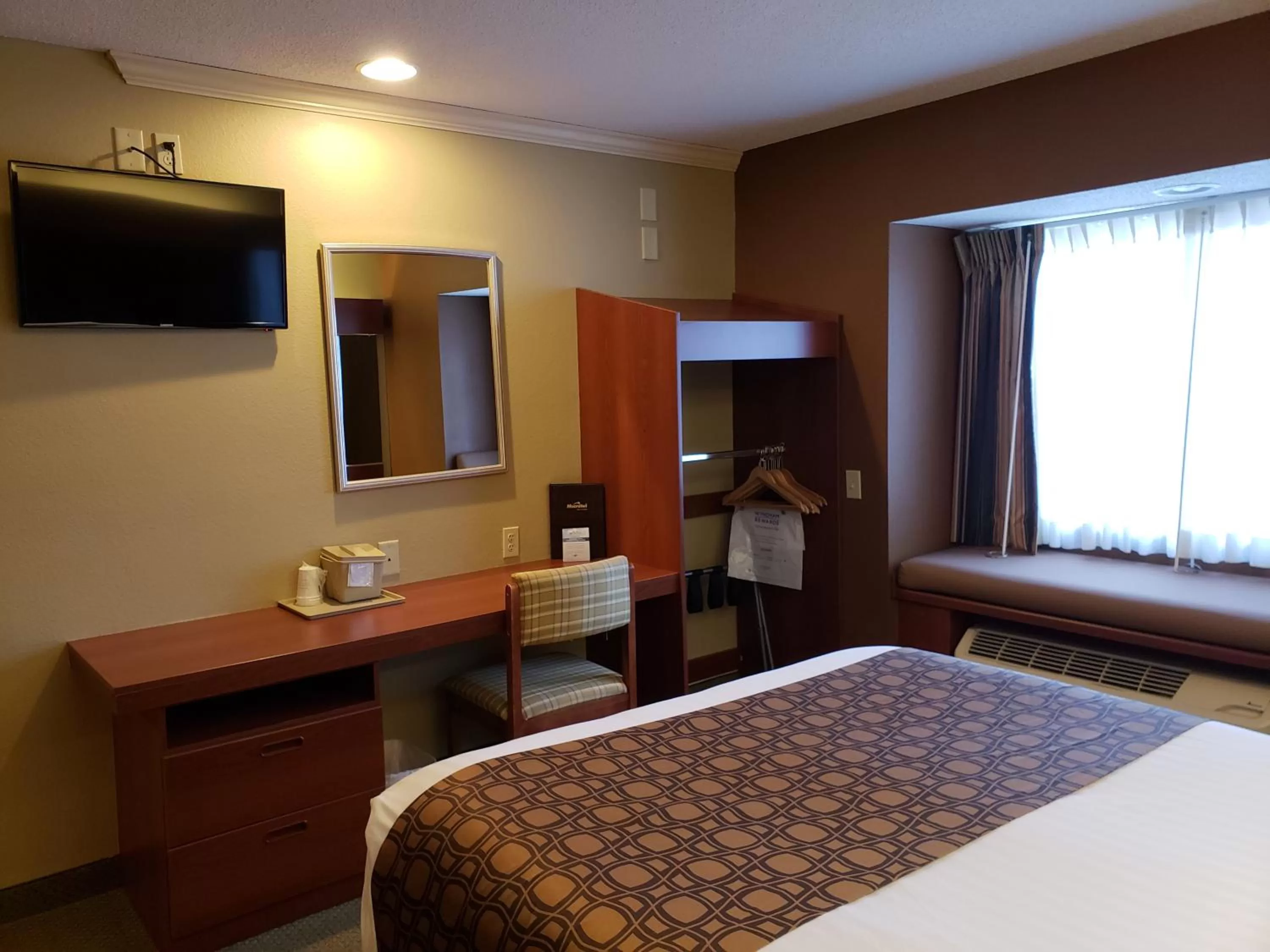 Bed in Microtel Inn & Suites by Wyndham Dover New Hampshire
