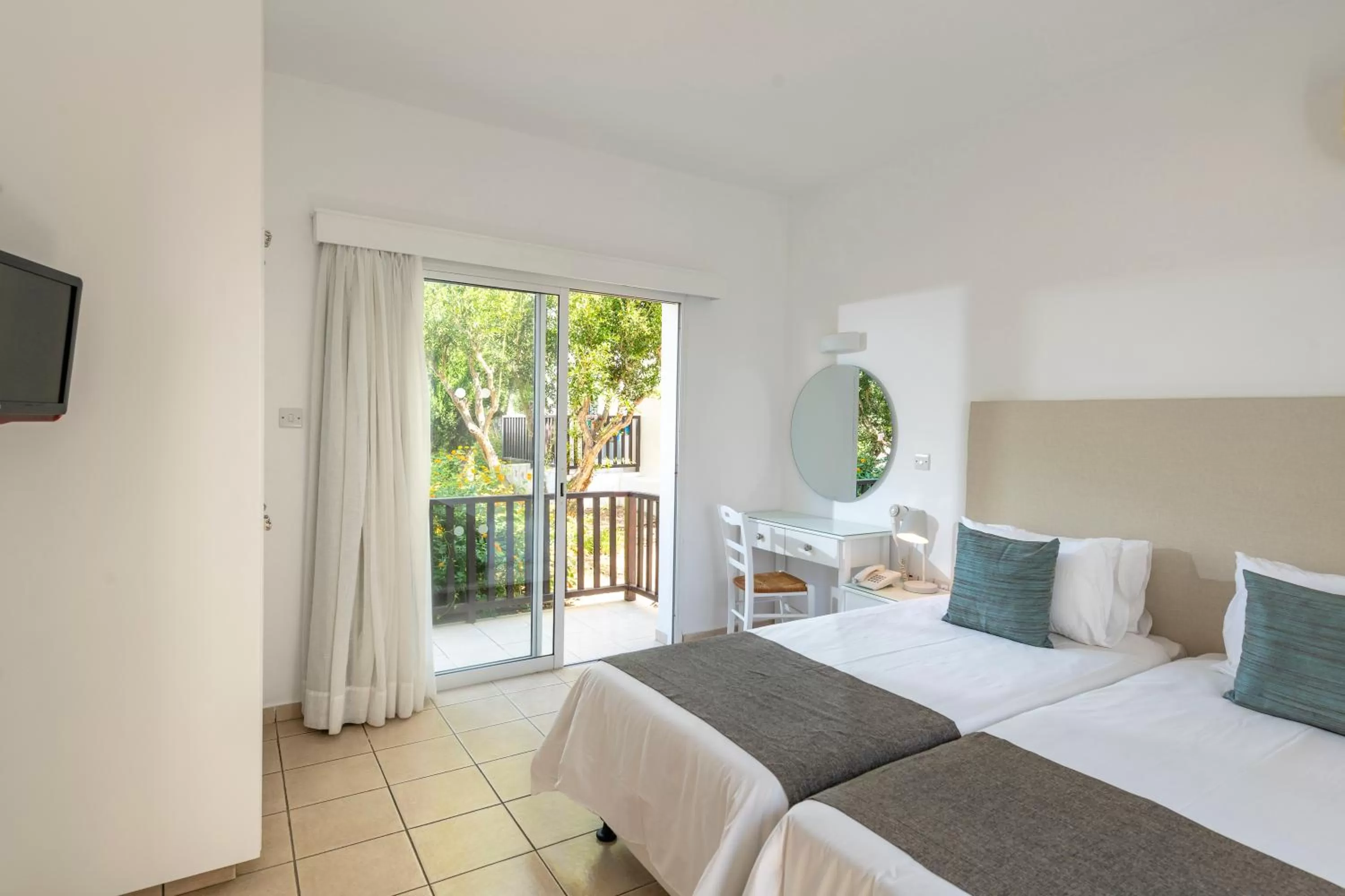 Bed in Akti Beach Hotel & Village Resort