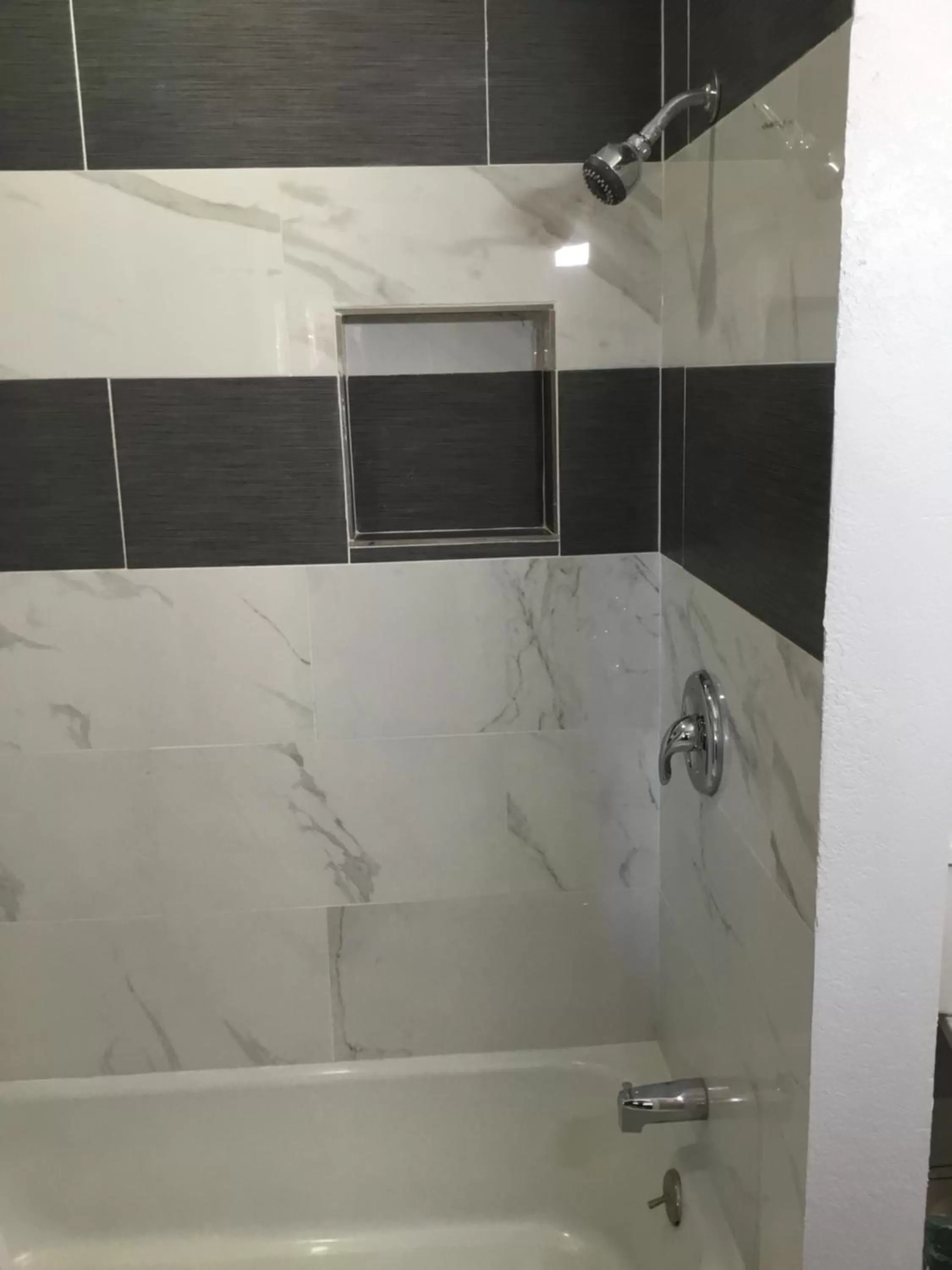 Bathroom in Budget Inn Plainview