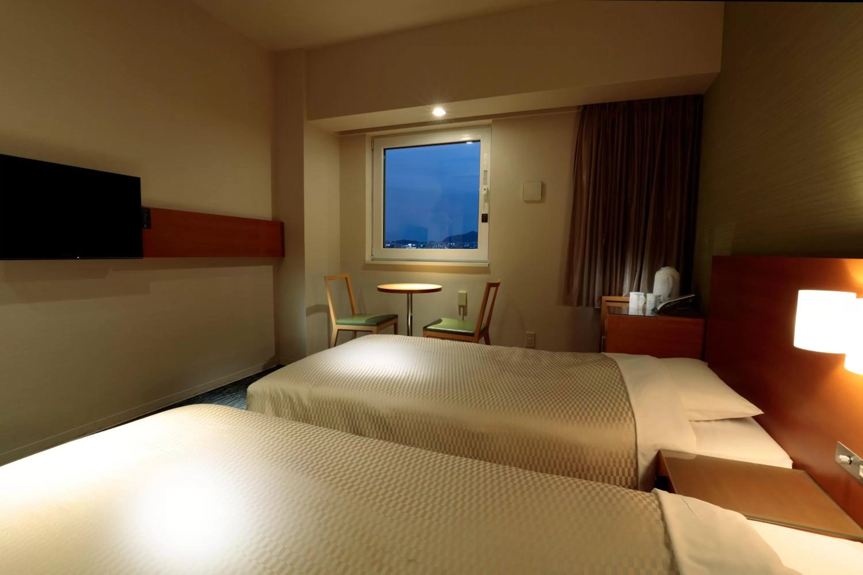 Photo of the whole room, Bed in Candeo Hotels Fukuyama