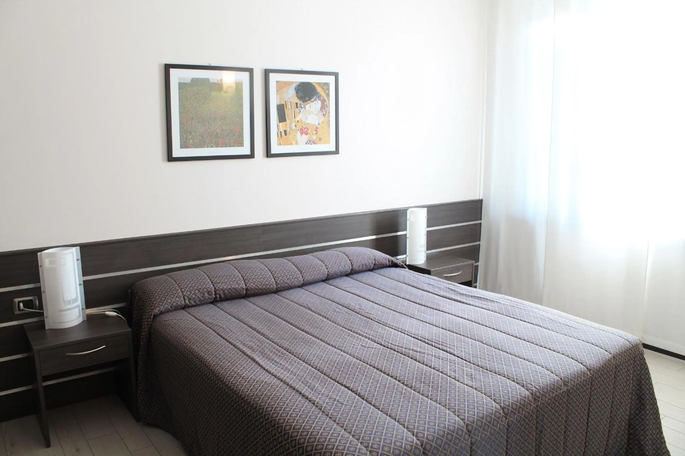 Bed in Hotel Residence Aurora