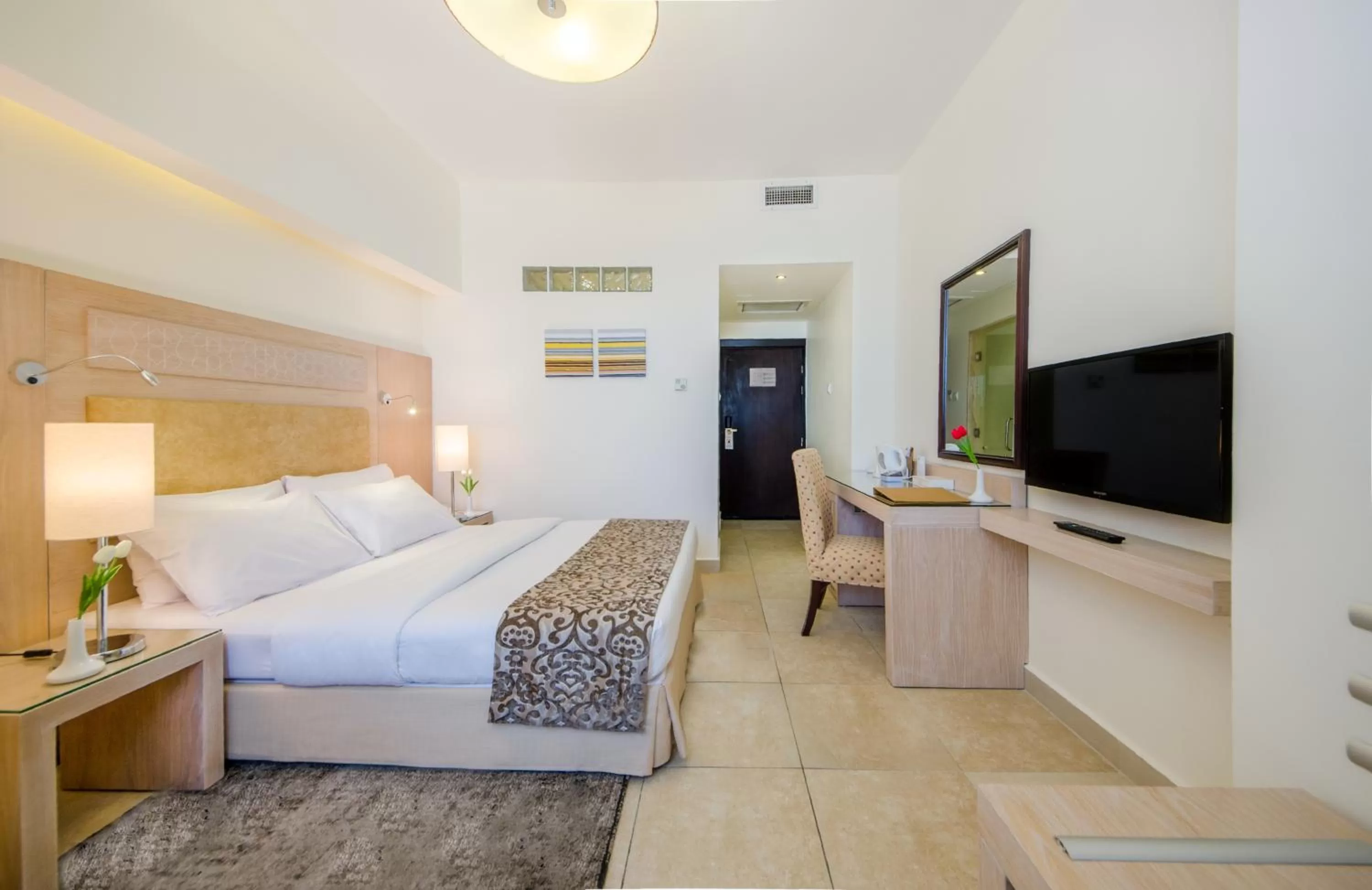 Bedroom in Toledo Amman Hotel