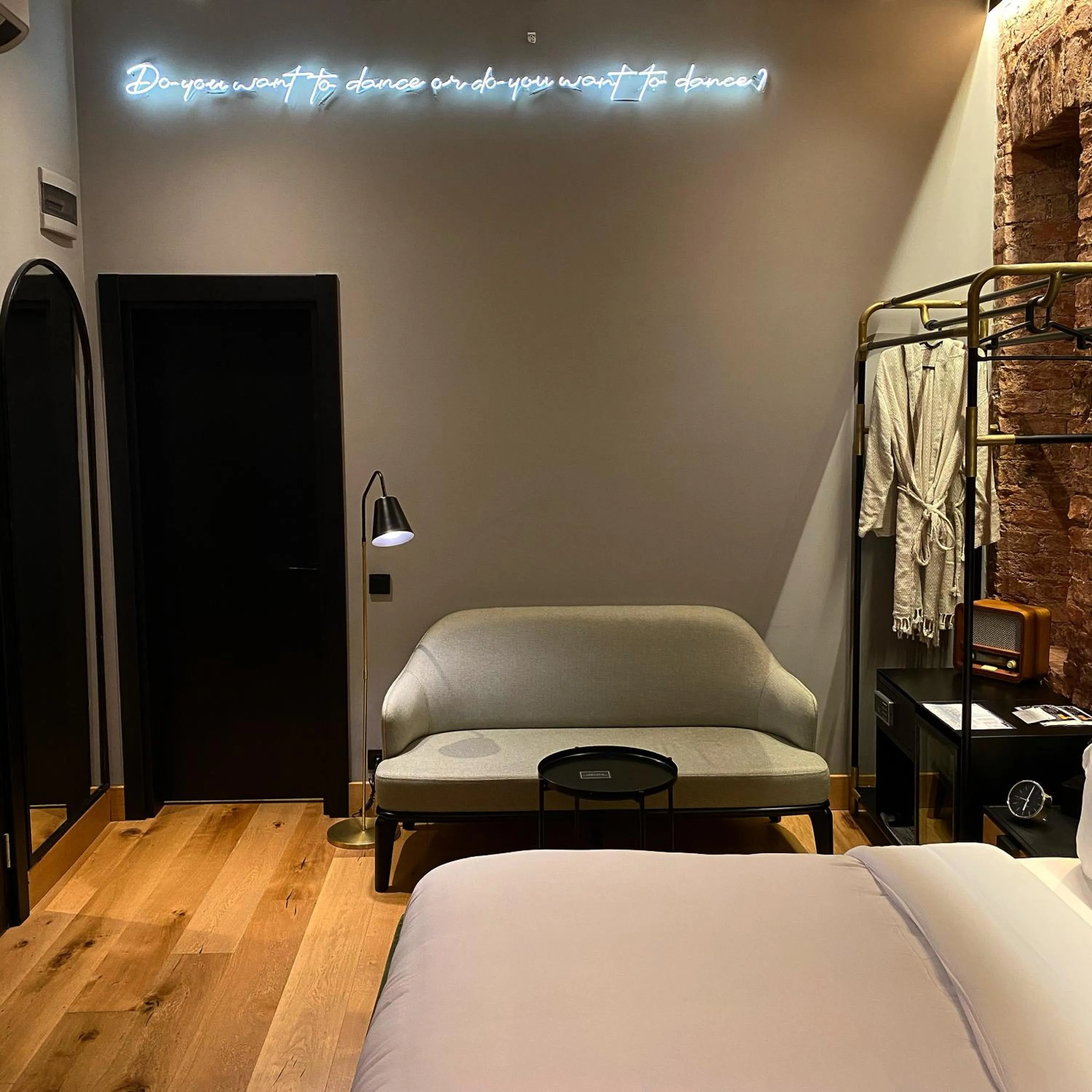 Seating area, Bed in RUZ Hotels